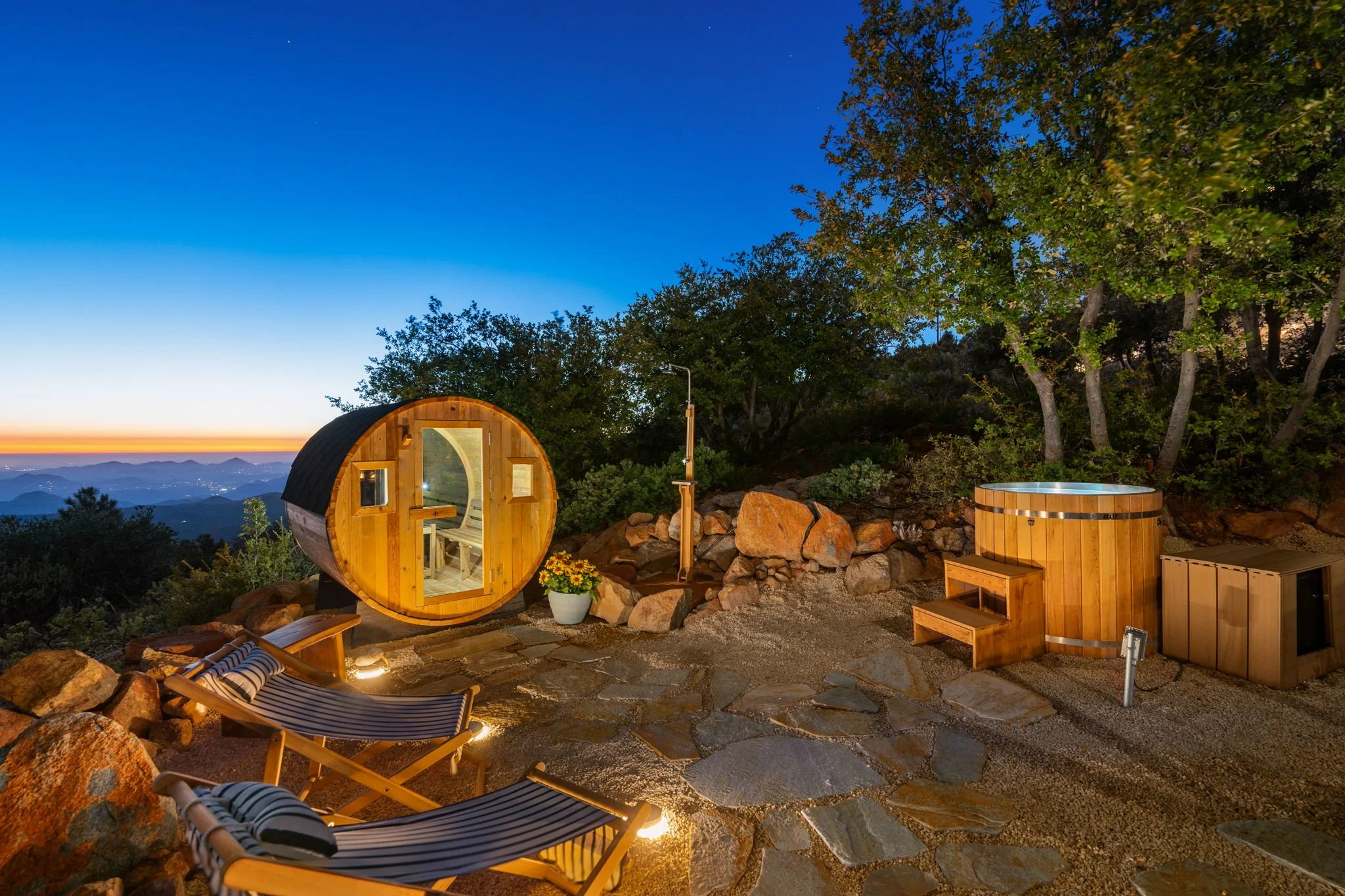 Private sauna and cedar cold plunge at dusk at Restore Outpost, Wild Moon Ranch near Julian