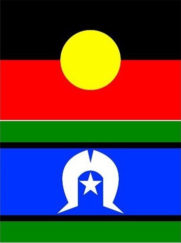 Flag with horizontal black, red, green, and blue stripes, and a yellow circle in the black stripe, and a white emblem with a star in the blue stripe.