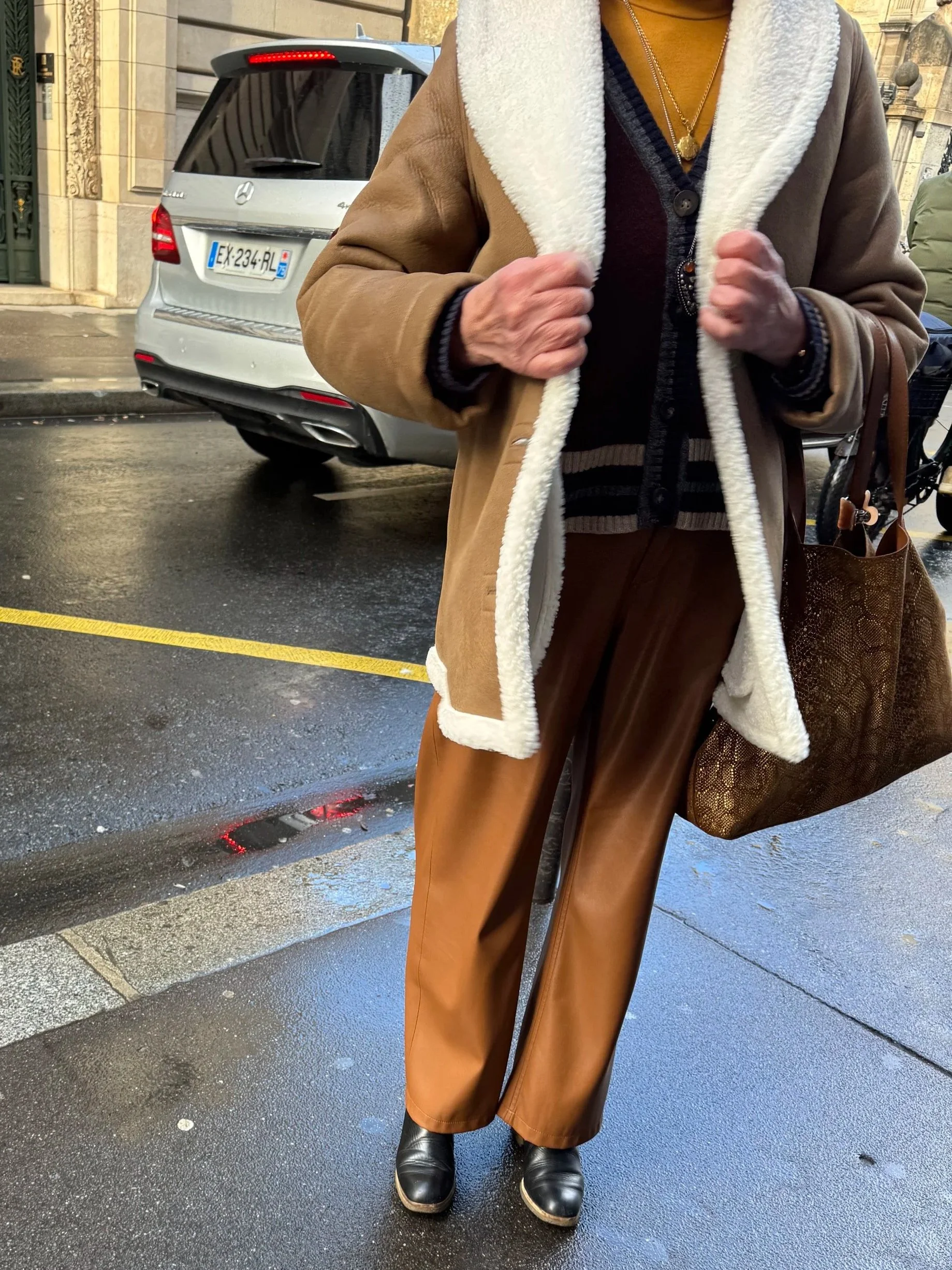 Chic for the bus - warm tones and metallic textured bag was so cool.