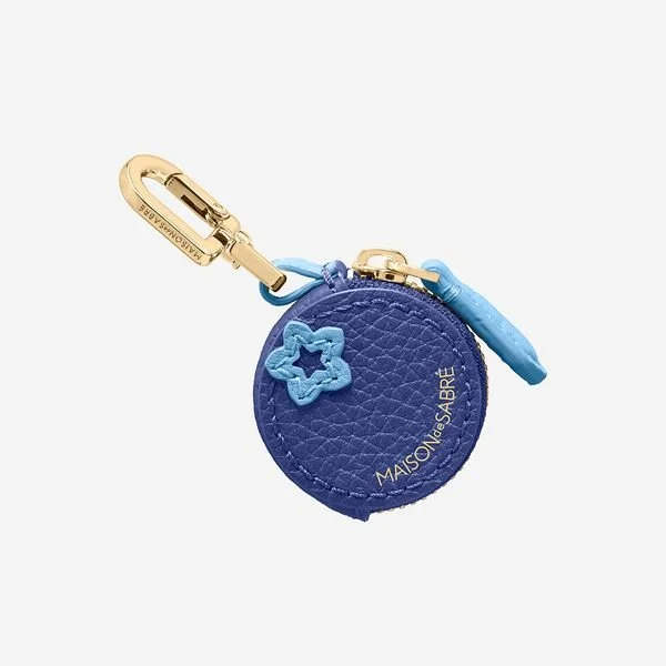 A blueberry charm for bags is an AirTag holder OR holds €10 worth of coins.  Made from leather off-cuts - I love mine!  Other fruits are available, too.