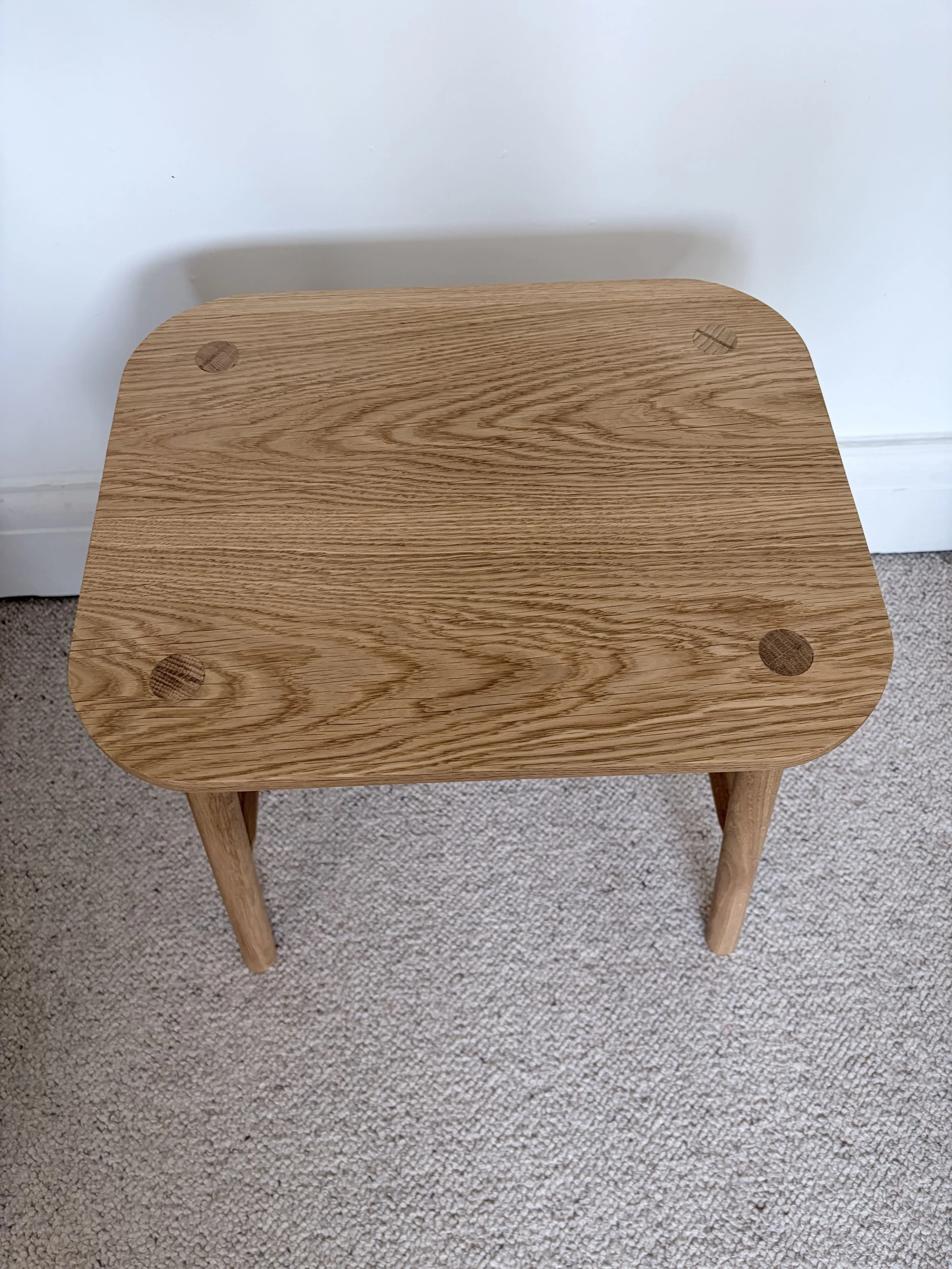 square dining table with rounded edges