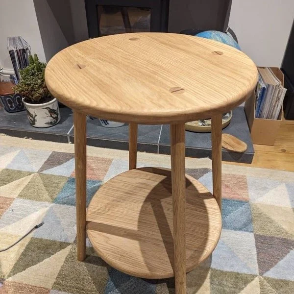 round dining table with shelf underneath