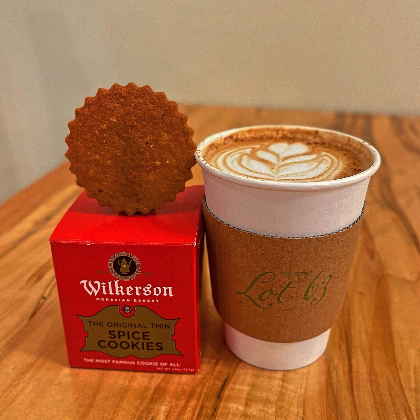 Lot 63&rsquo;s Signature Latte:  A latte so nice, thanks to Moravian Spice ☕️🍪✨ 

@wilkersonbakery is known for their warm, thin and crisp spice cookies. Thanks to their special spice blend syrup, that same great taste pairs perfectly with our coffe