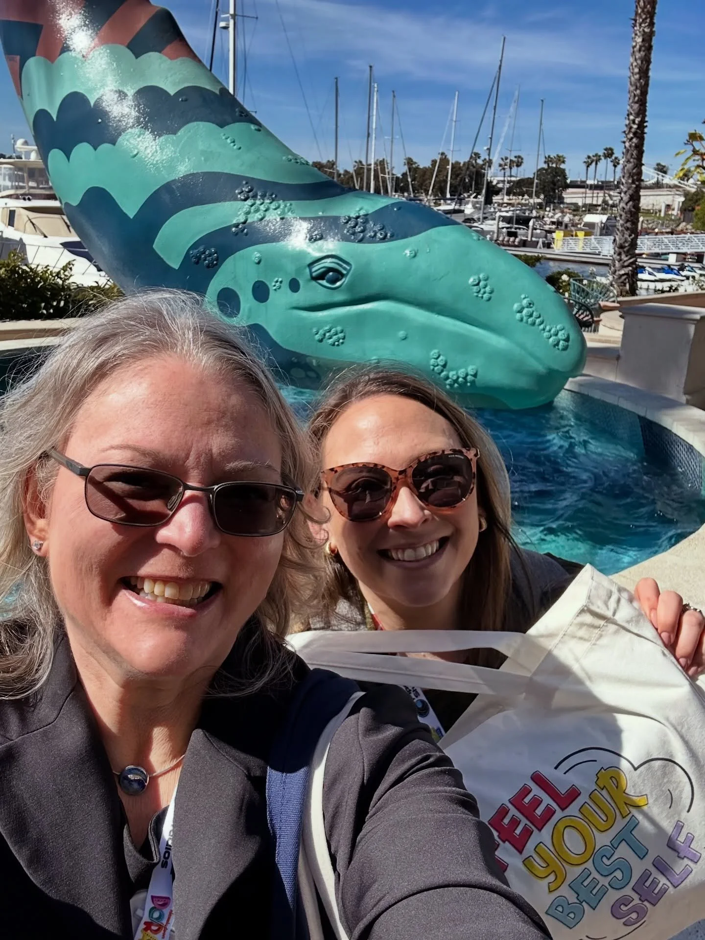 Kidscreen Summit Day 1: FYBS co-creators Dr. Sandy C and Emily W stopped to Smell the Roses by enjoying the sunny skies! 🌴😎 #kidscreen