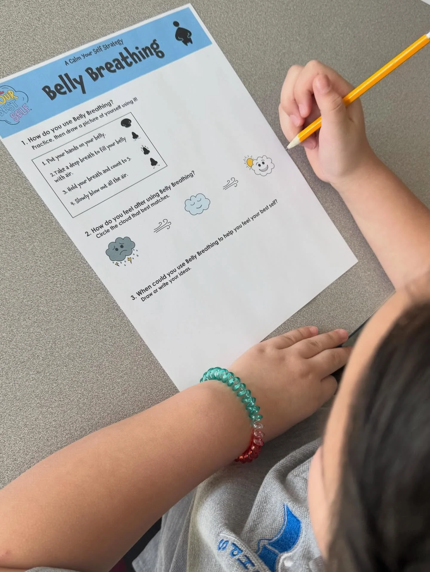 Second graders taking a quiet moment to reflect after Belly Breathing 💭✨ Check out our free downloadable Reflection Sheets on our website!