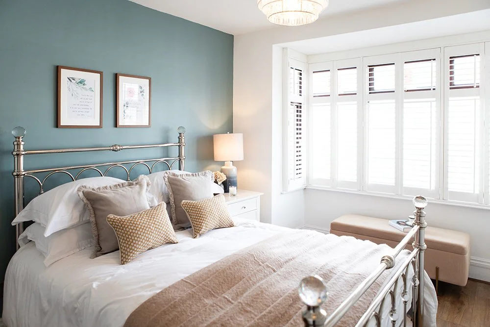 	An inviting, minimal bedroom space that honours rest and restoration. Natural materials and warm lighting evoke a quiet, comforting energy.