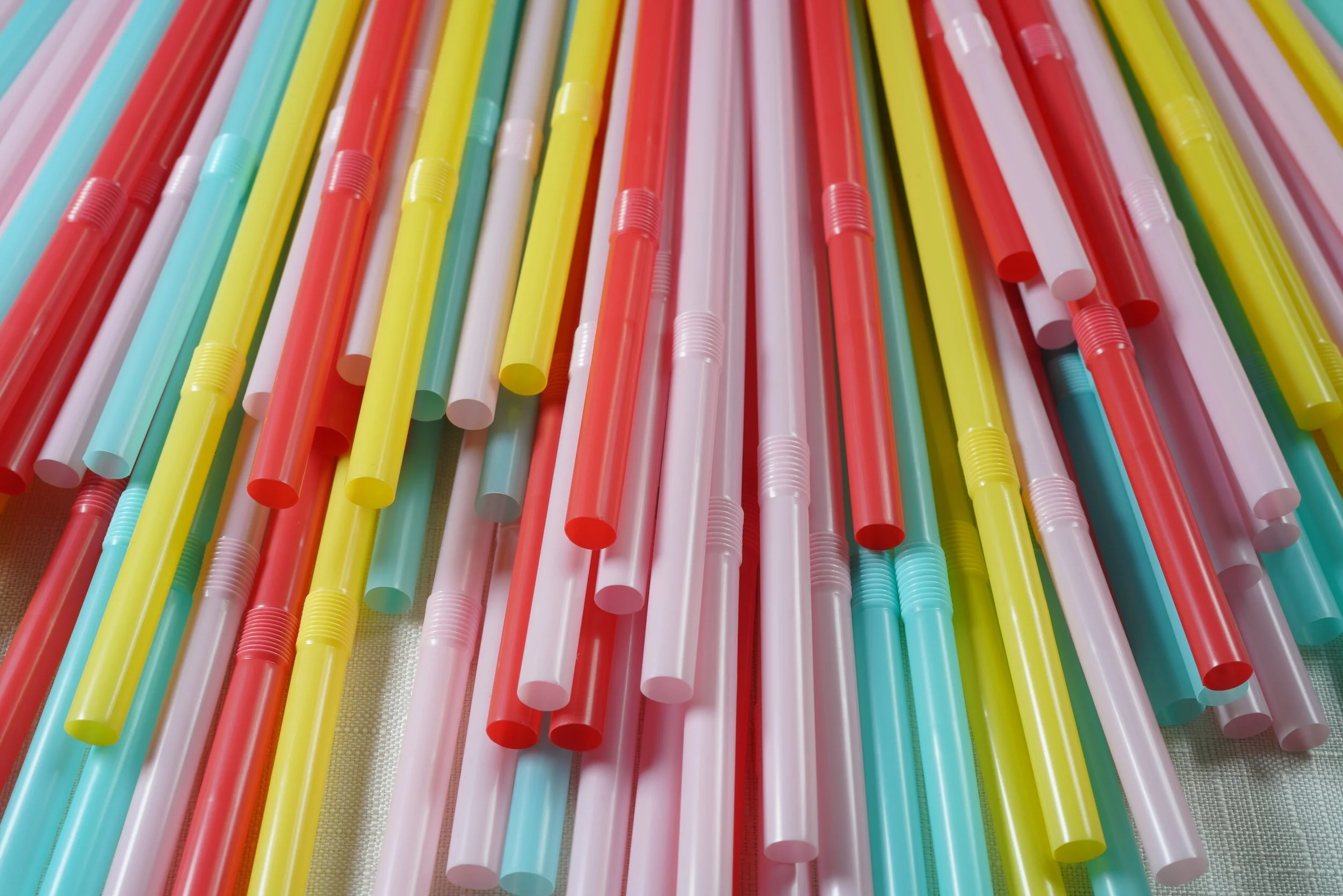 plastic straws in an assortment of colors