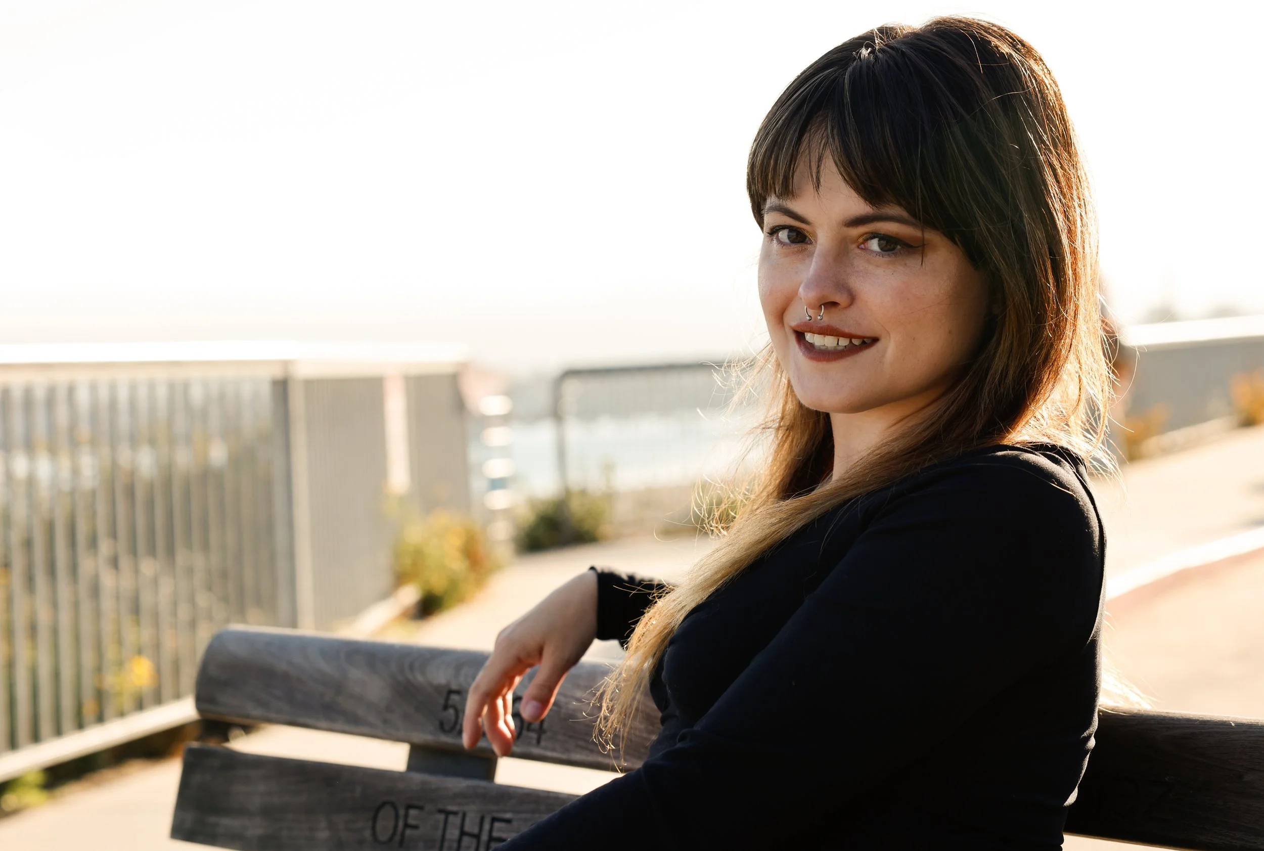 tess dunn, content strategist, smiles at the camera in santa cruz california