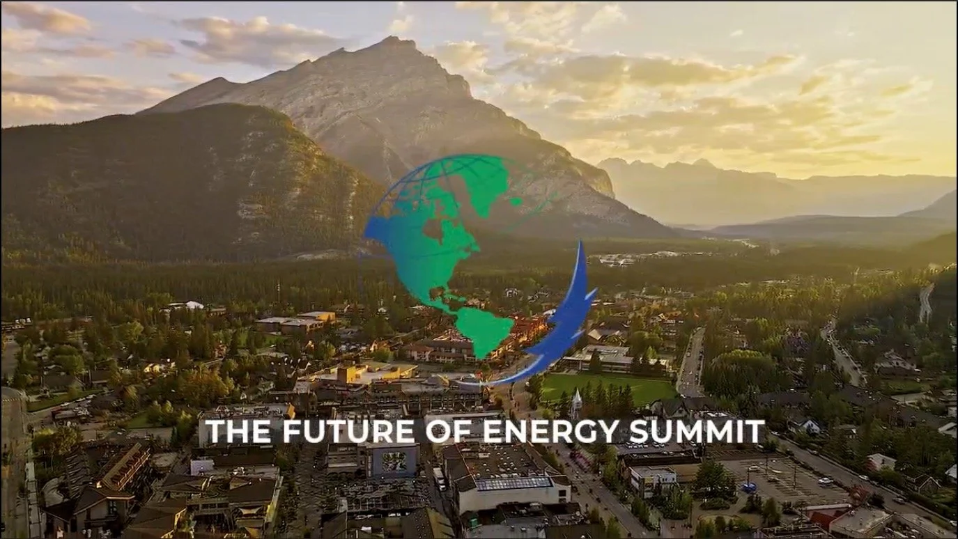 A cityscape of Banff, Alberta, Canada with mountains in the background during sunset, with an overlay of a globe and arrow graphic. Text reads 'The Future of Energy Summit.'