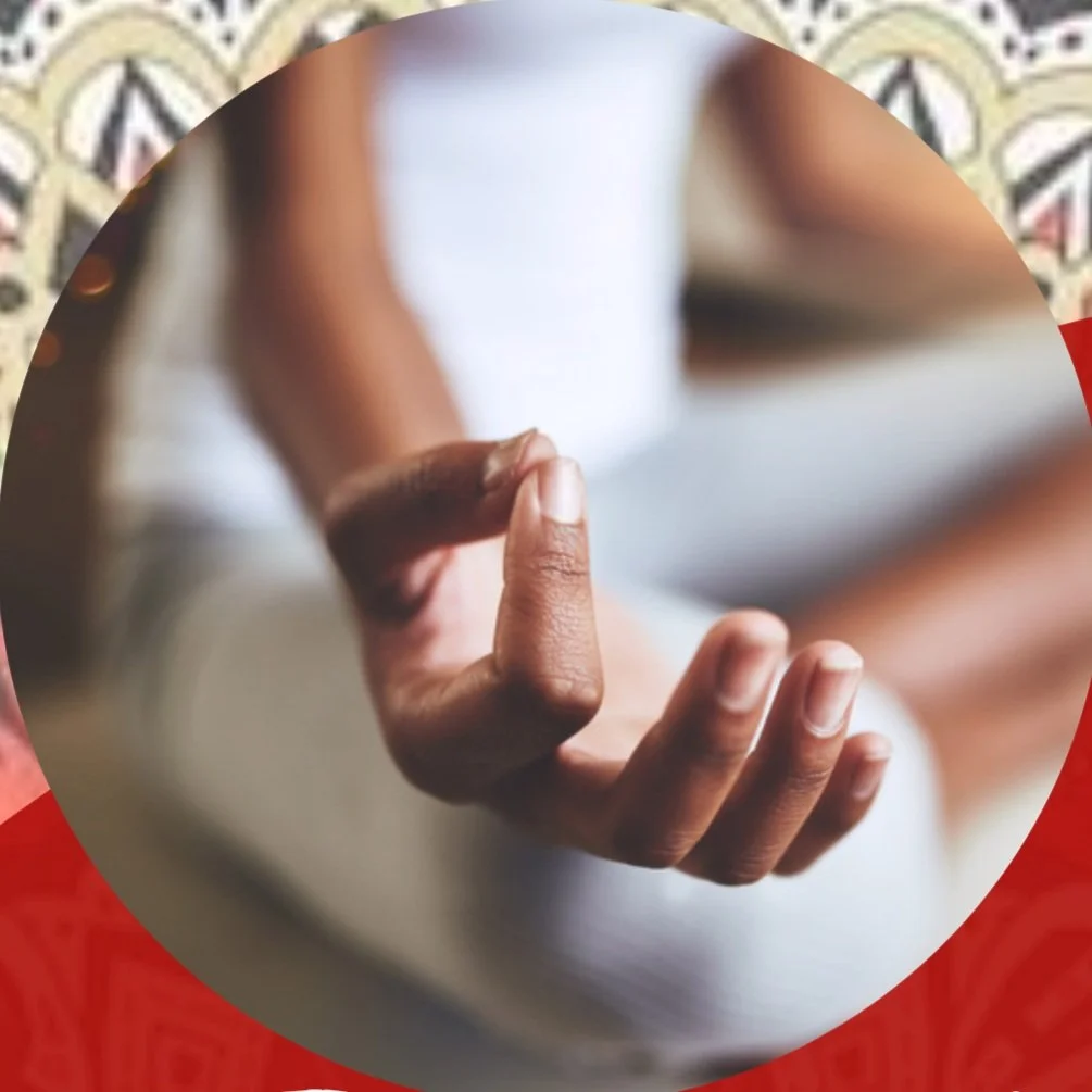 Person practicing meditation with hand in a mudra position
