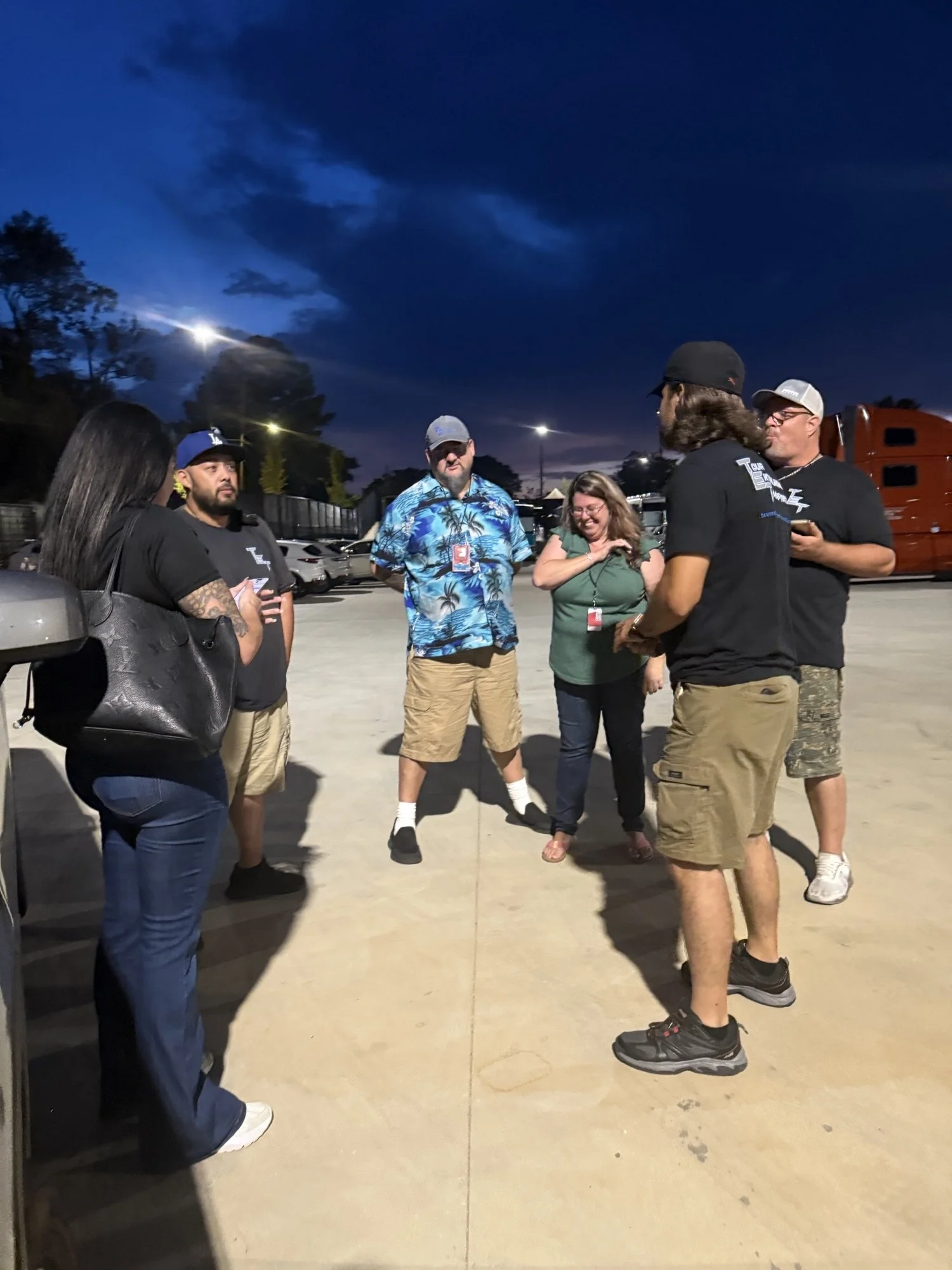 Tour Entertainment Transportation touring crew and drivers coordinating multi truck concert logistics after load out