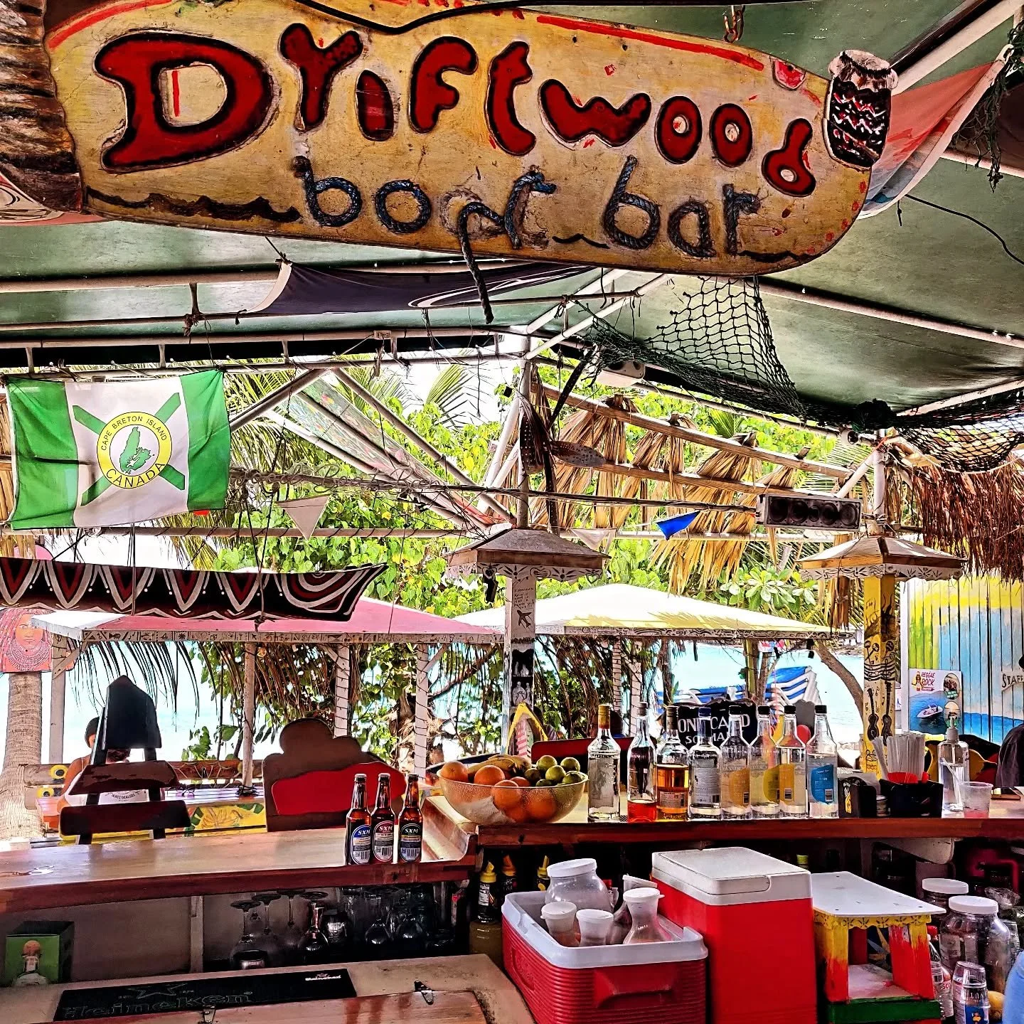 Driftwood bar at Maho Beach. Planes landing overhead SXM happy 😁