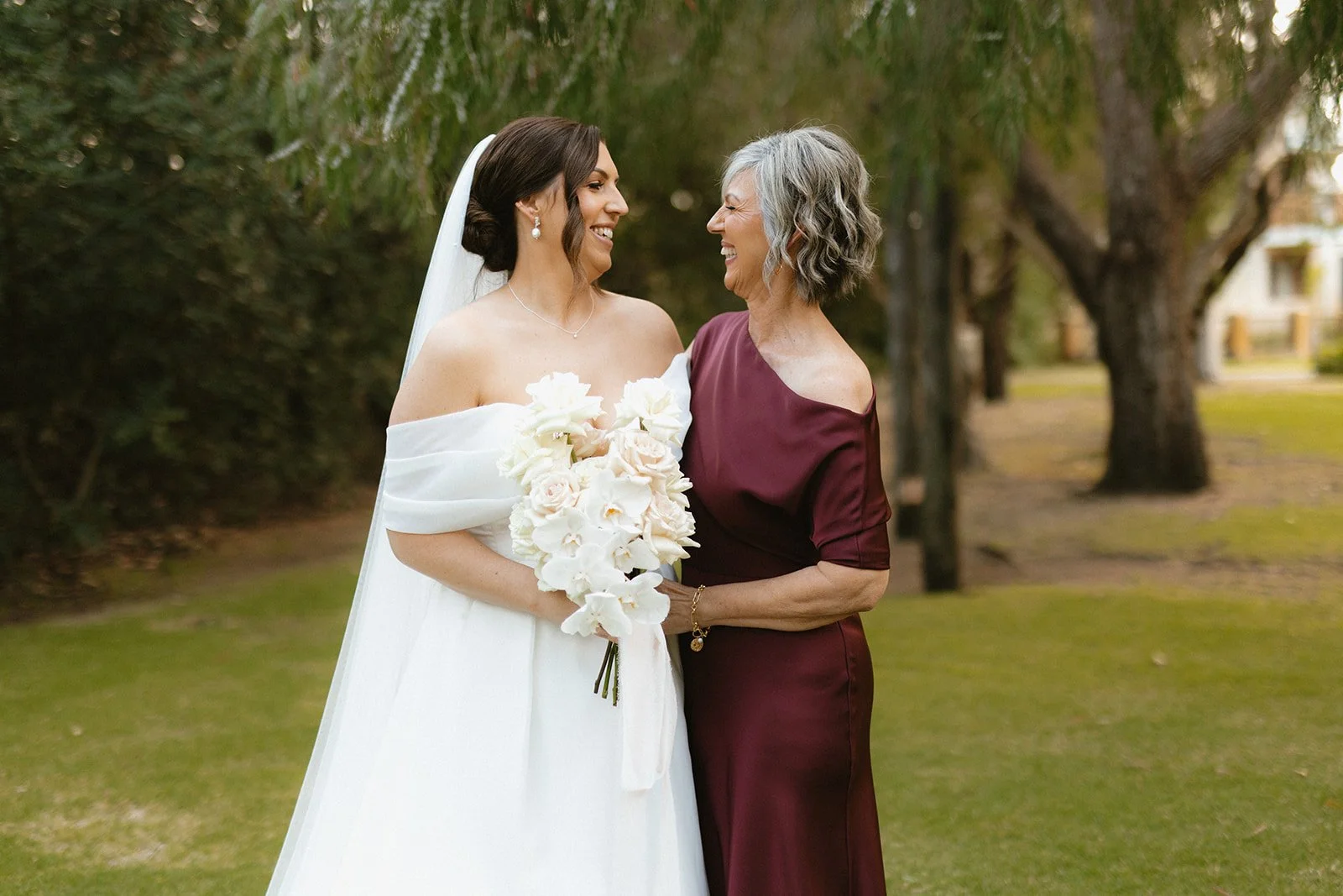 Our Bride Danielle wearing her custom heirloom wedding veil. Featuring her mother's bridal veils embroidery.

Taylah Jayde Photography 