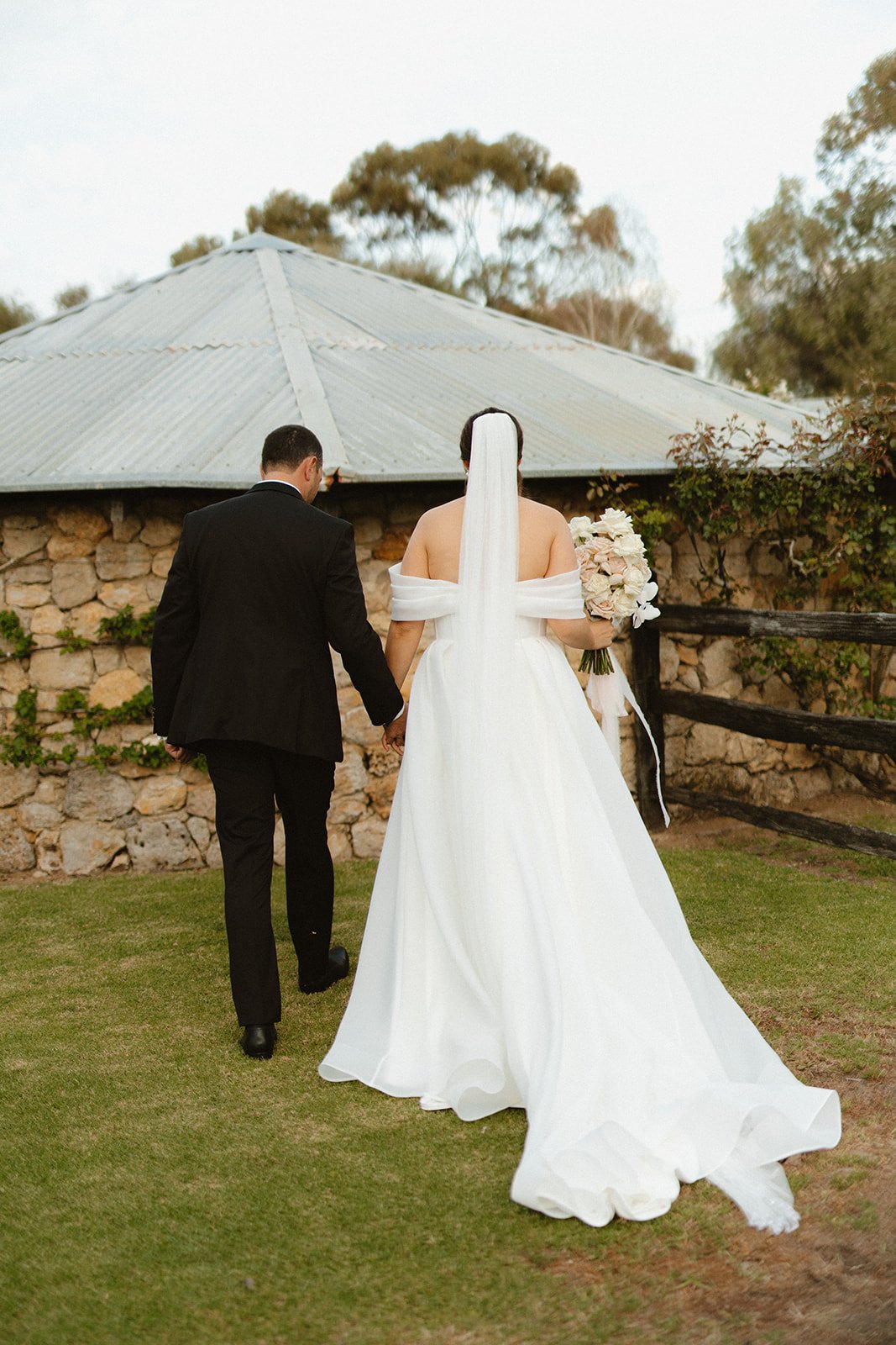 Our Bride Danielle wearing her custom heirloom wedding veil. Featuring her mother's bridal veil's embroidery and modern pearls.

Taylah Jayde Photography 