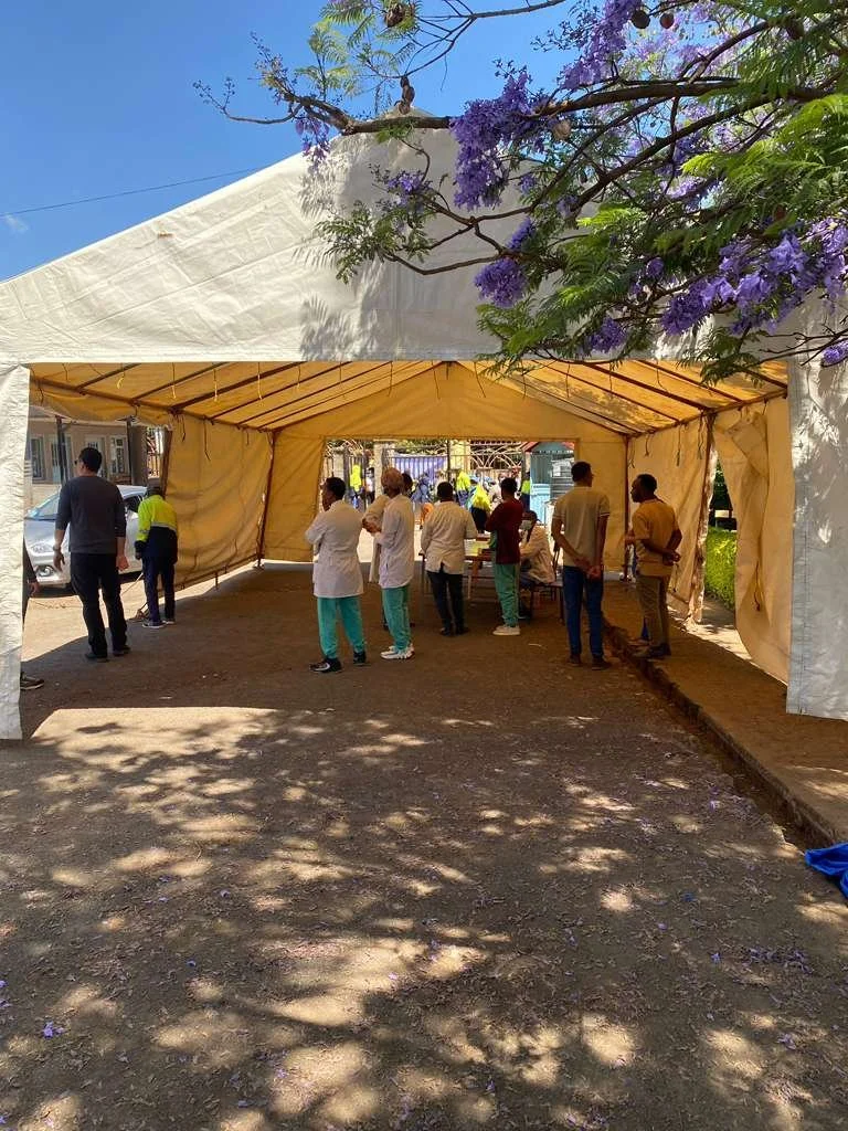 Luis setting up our new screening tent