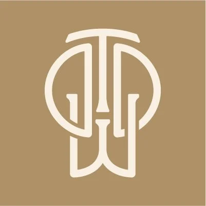 Monogram with white overlapping letters "T" and "P" on a brown circle background.