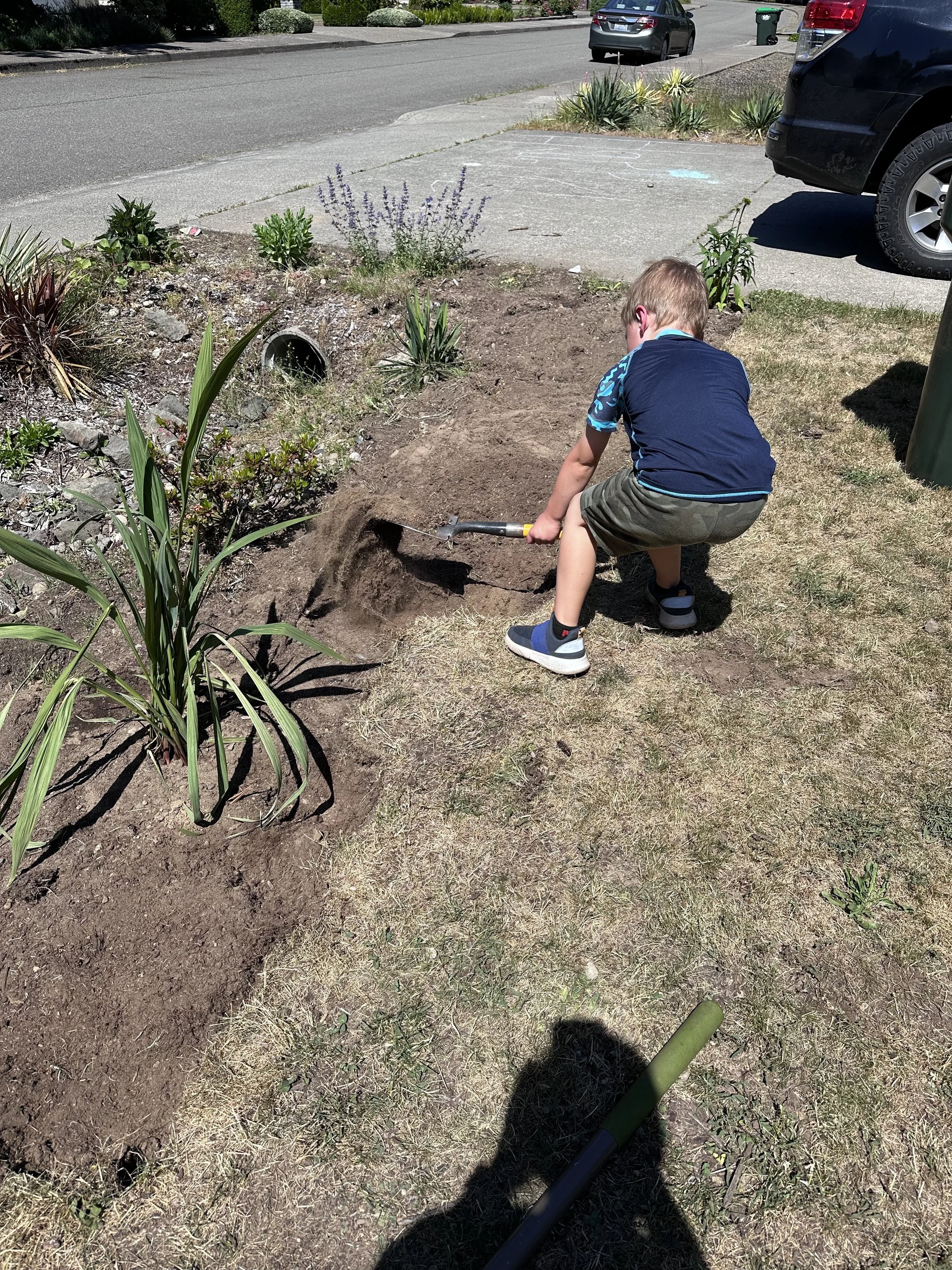 calvin helping with ditch.jpg