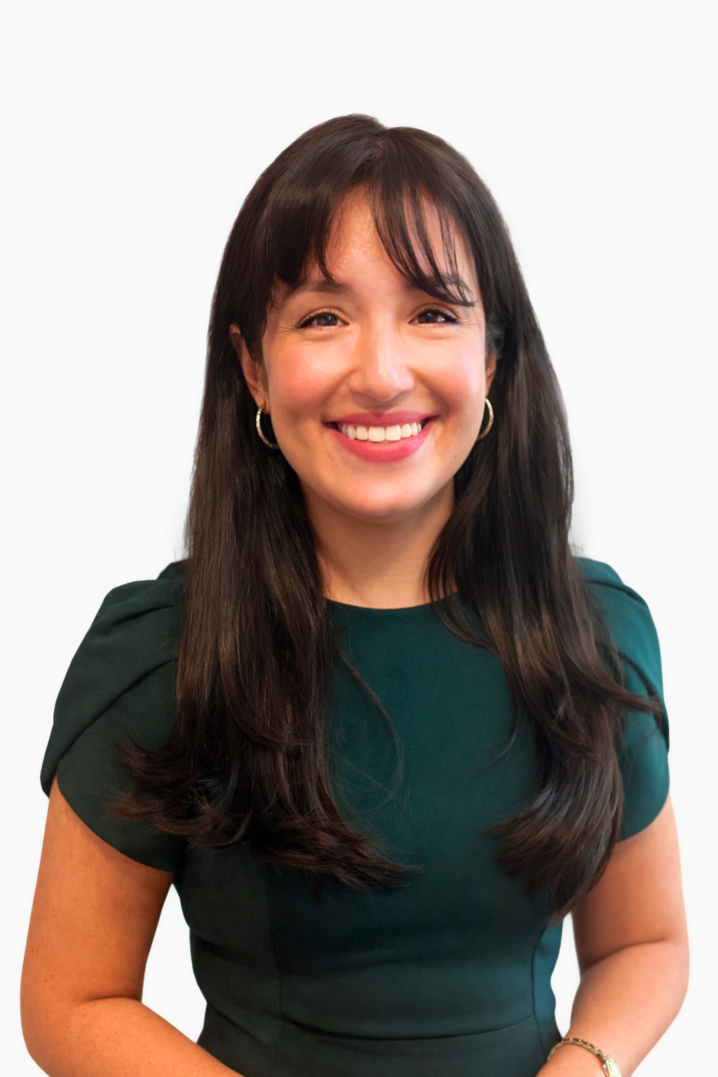 Laura Alvarado - Woman with green dress and dark hair.