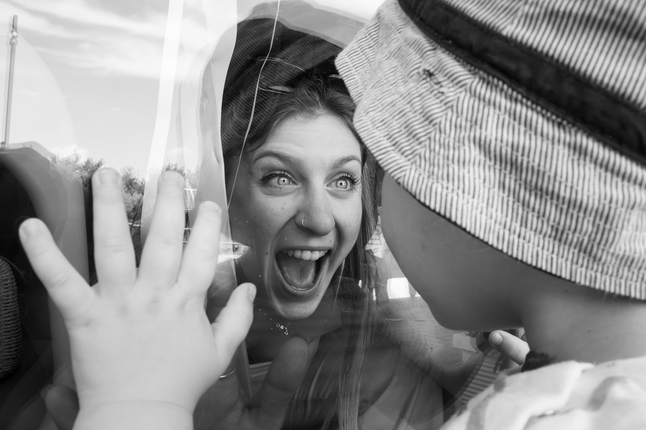 Bambini fotografia spontanea bologna battesimo