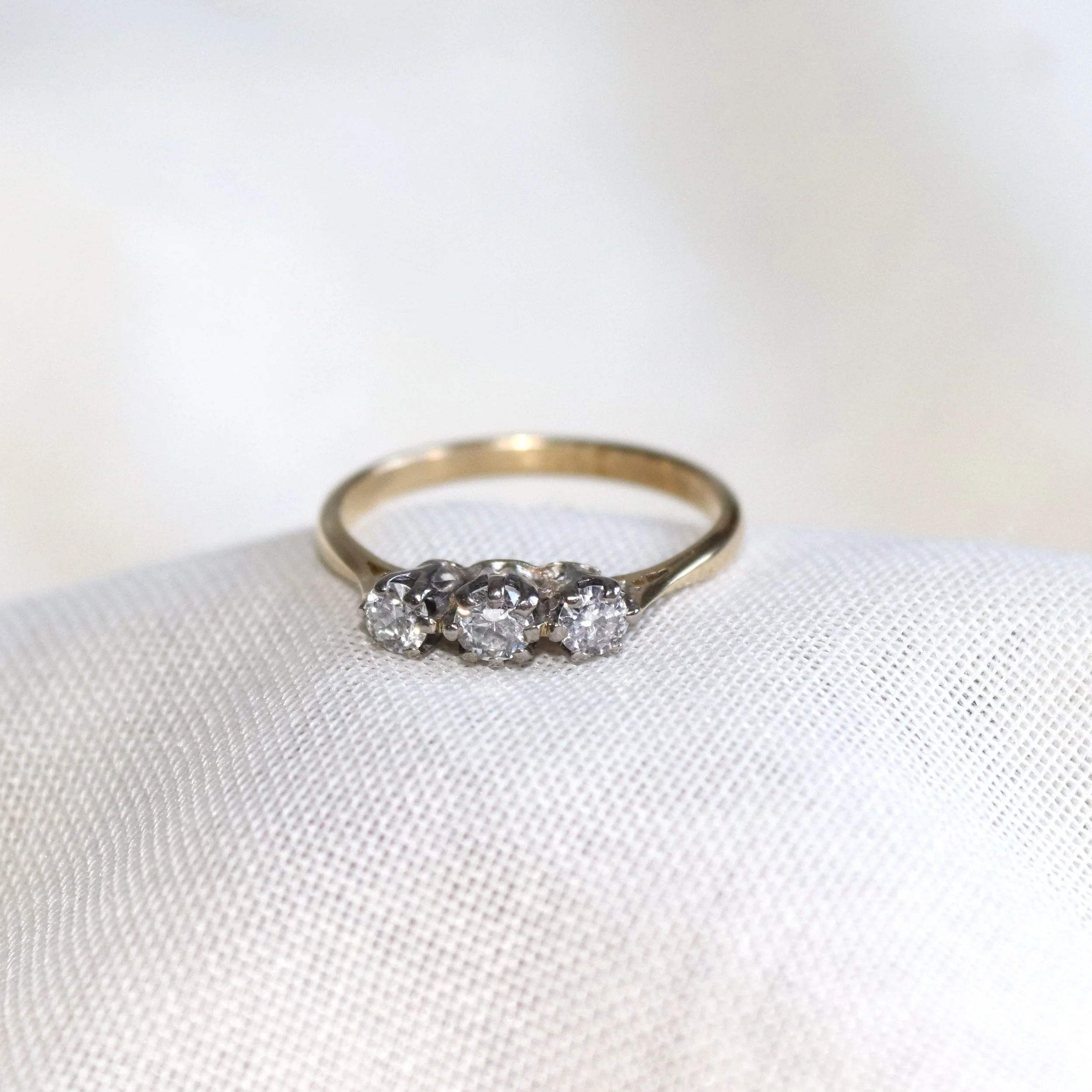 3 stone diamond ring.jpg