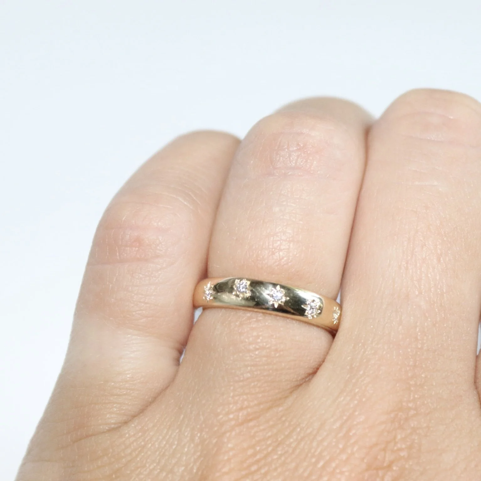 gold star set wedding ring.jpg