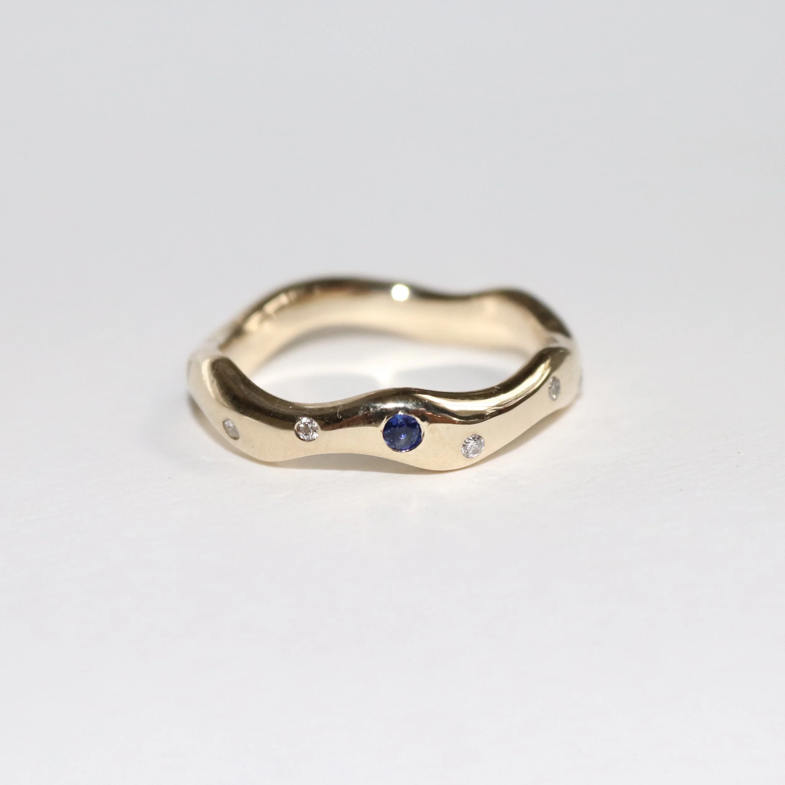 wave sapphire heirloom band from melted gold