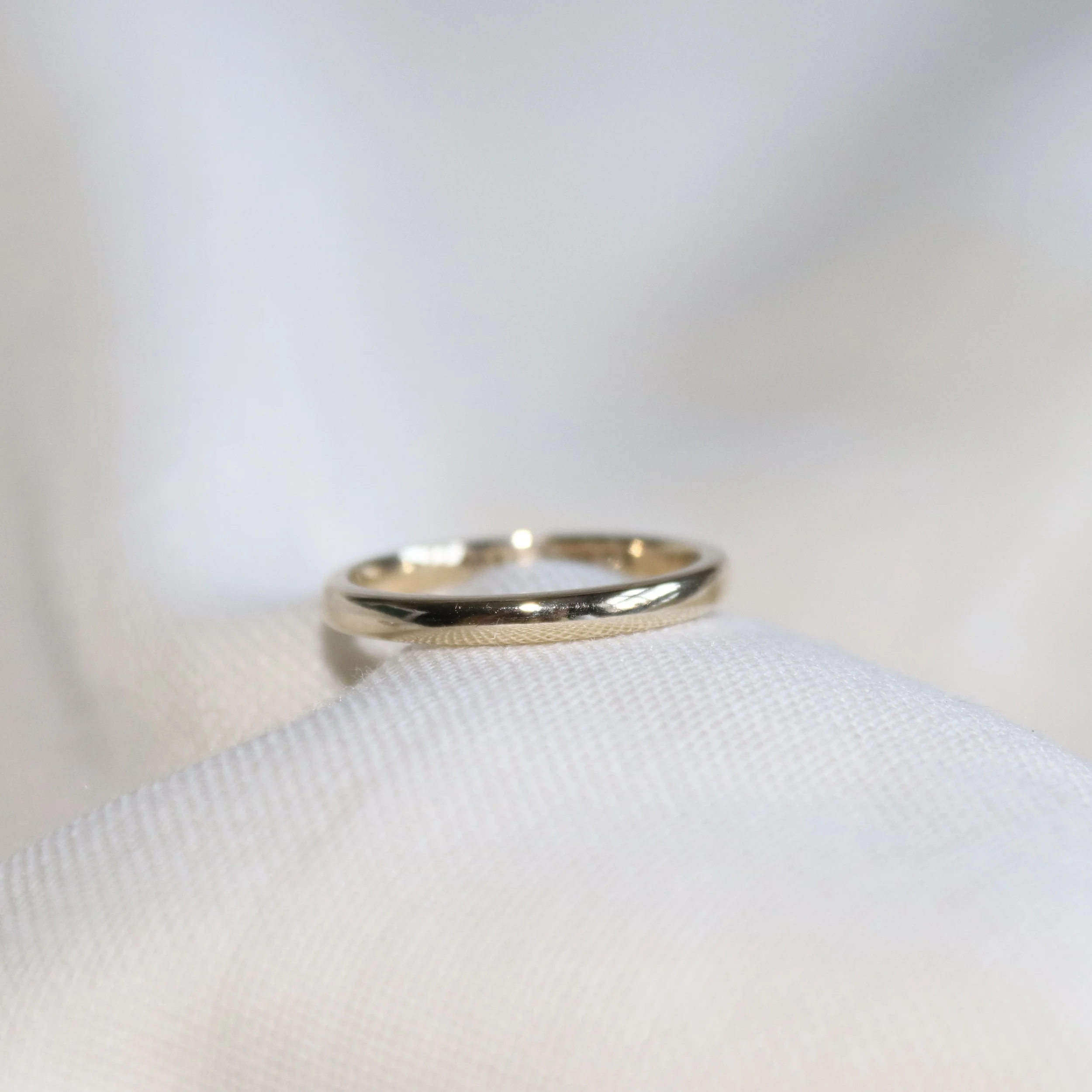 solid gold wedding band.jpg
