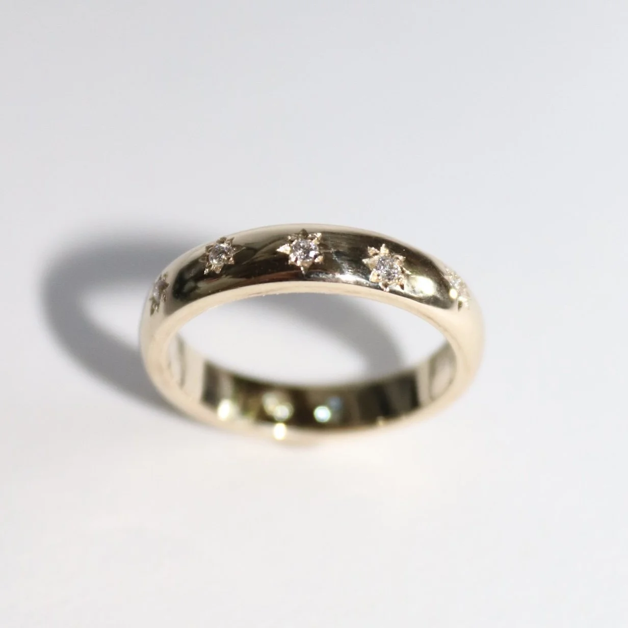 9ct star set wedding ring.jpg