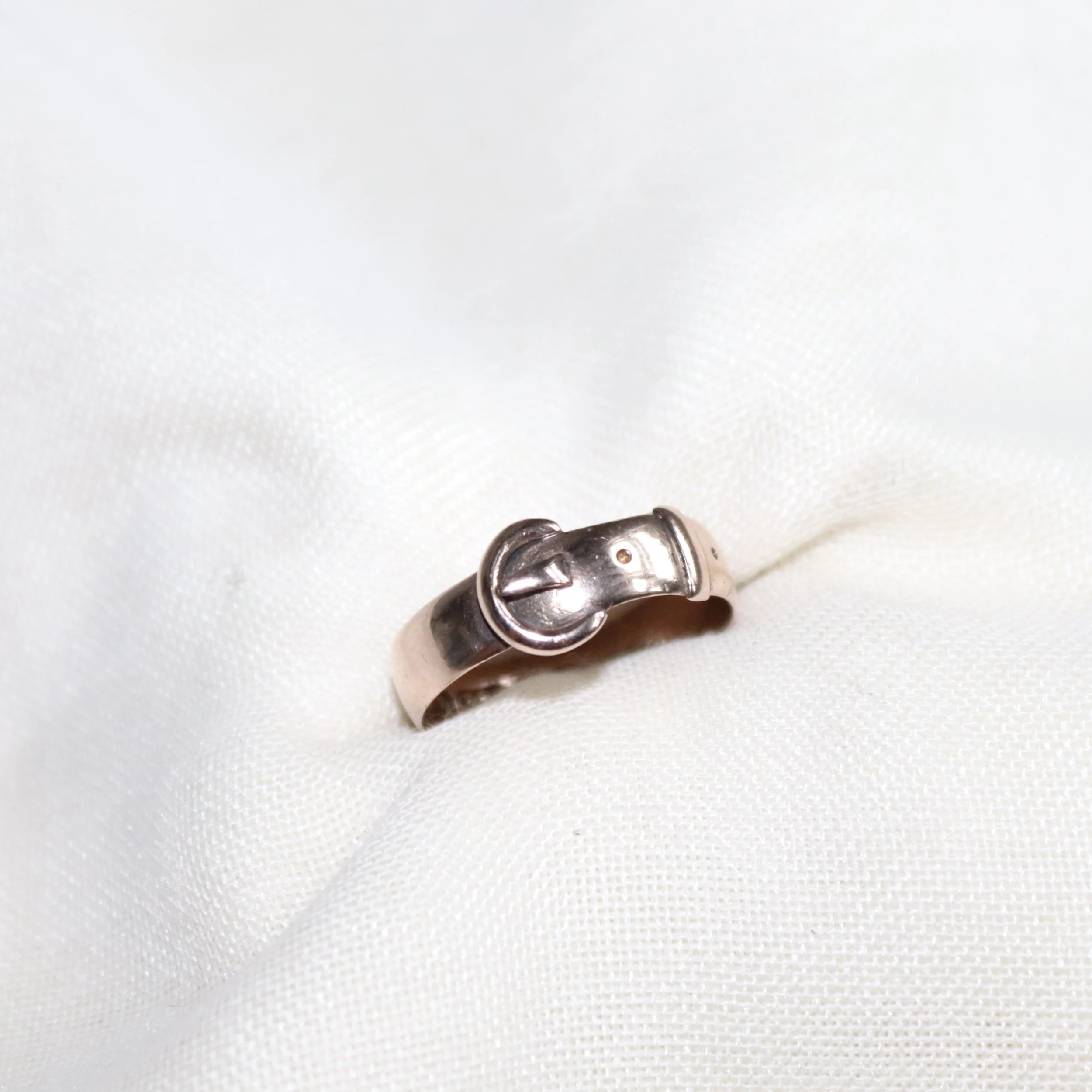 rose gold buckle ring.jpg