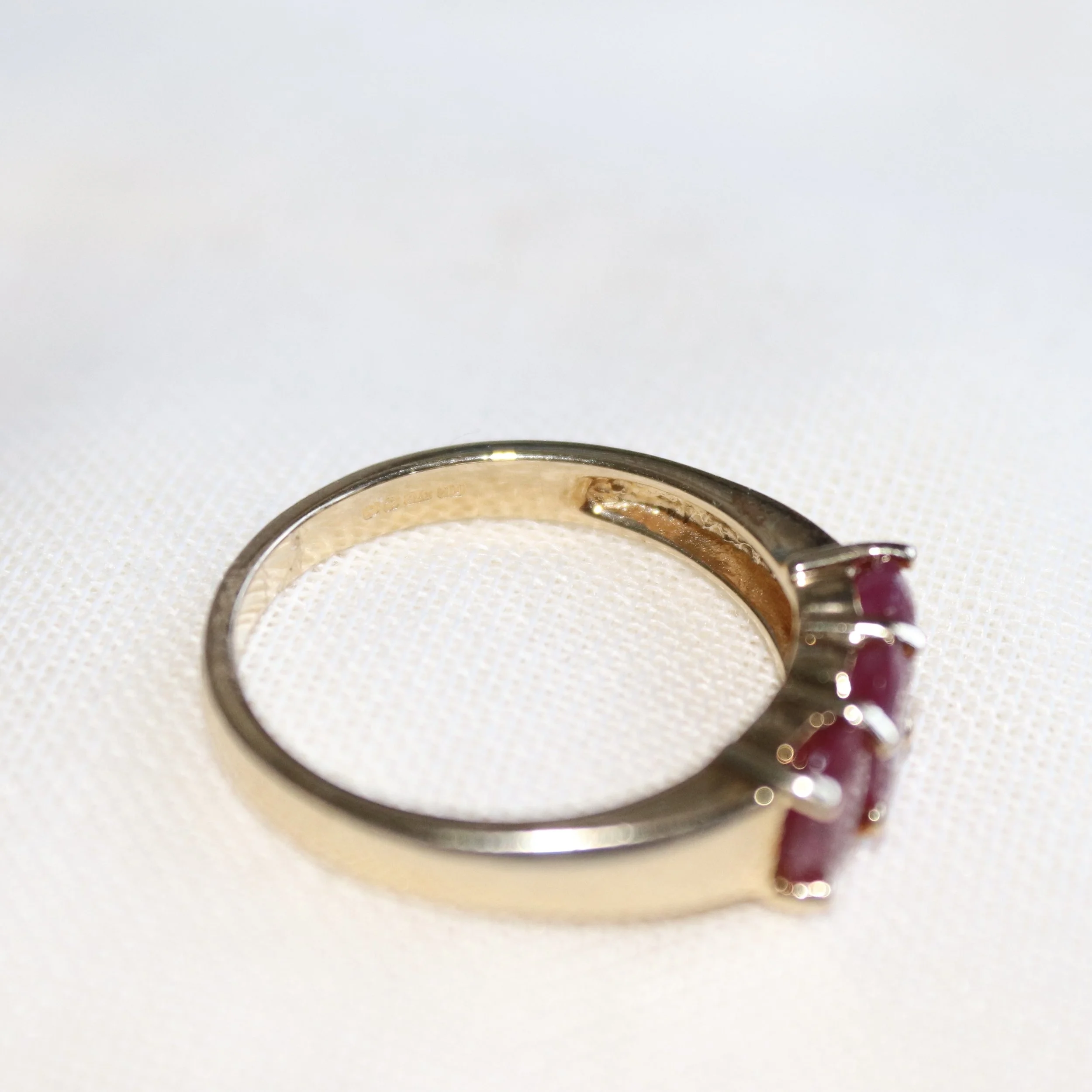 oval trilogy ring rubies.jpg