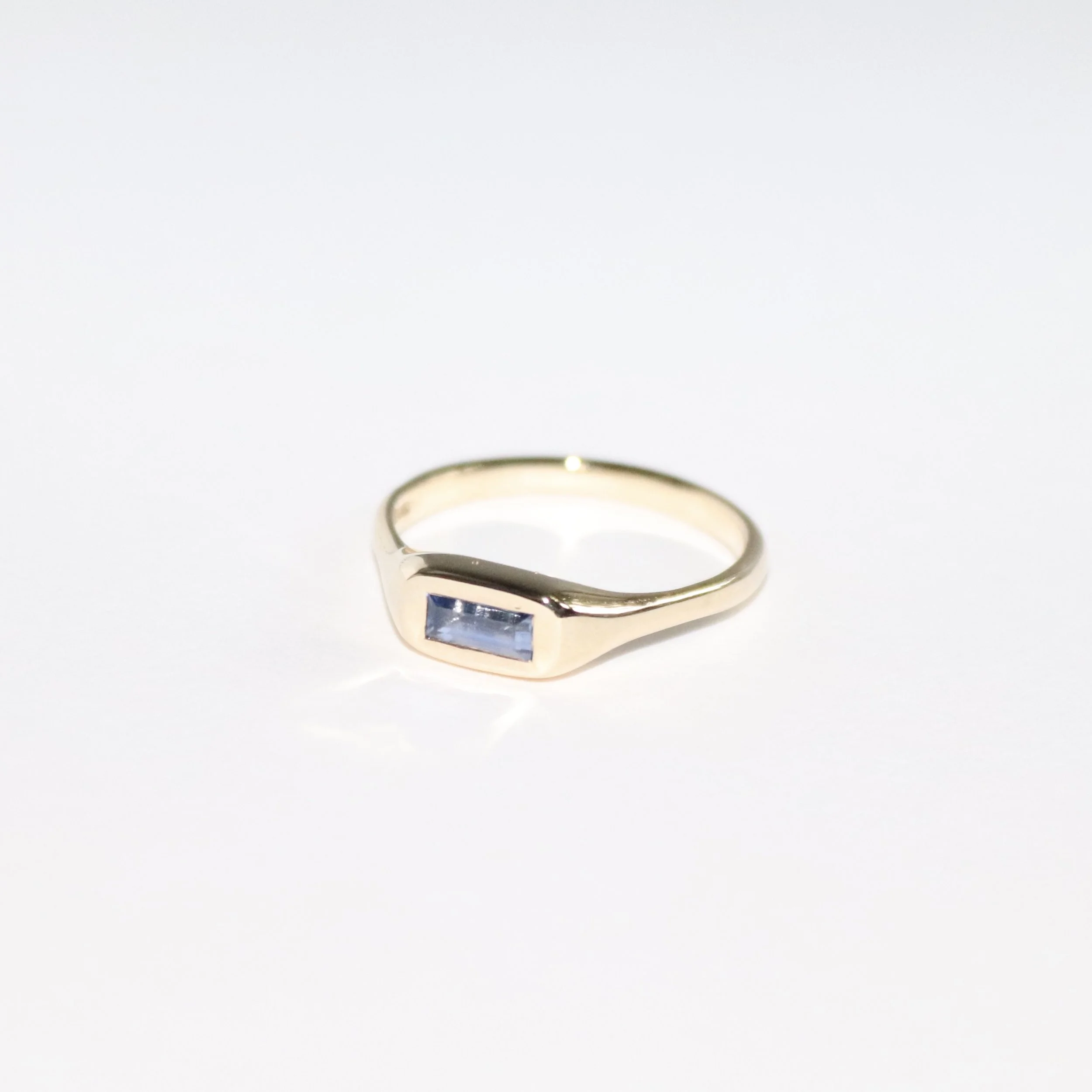 A bespoke 9ct Gold Blue Sapphire Baguette Engagement Ring