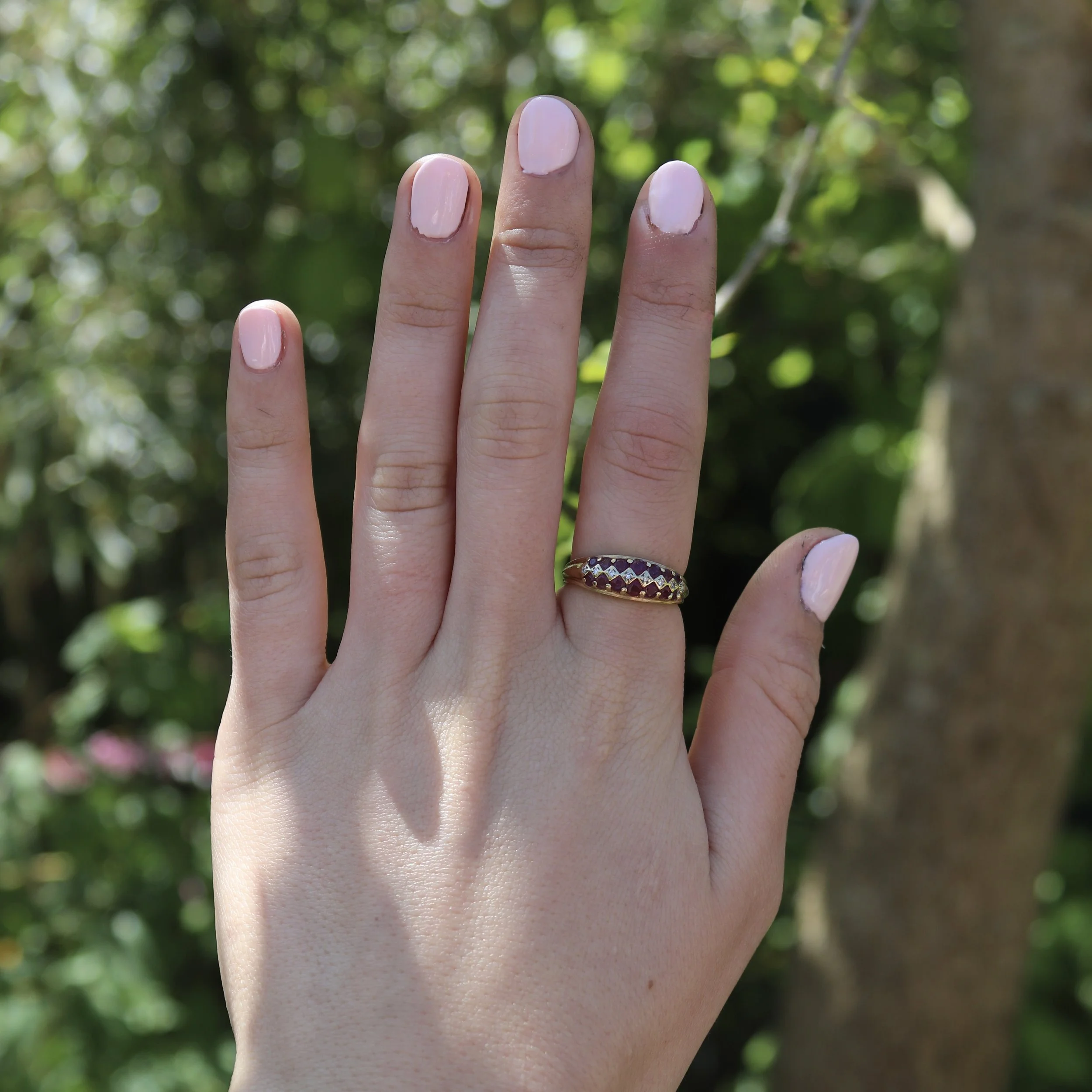 9ct gold ruby and diamond bombe ring.jpg
