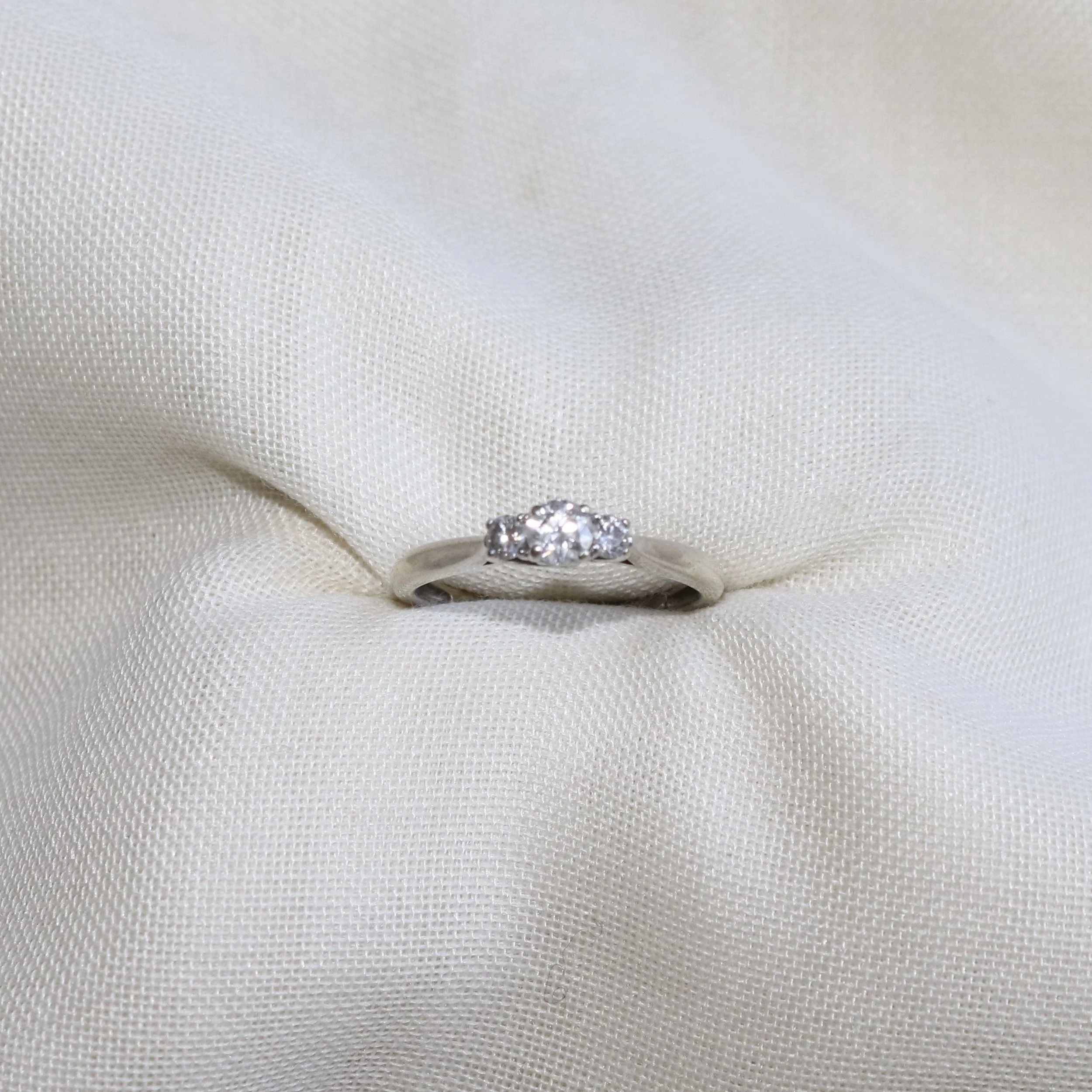 white gold diamond trilogy ring.jpg