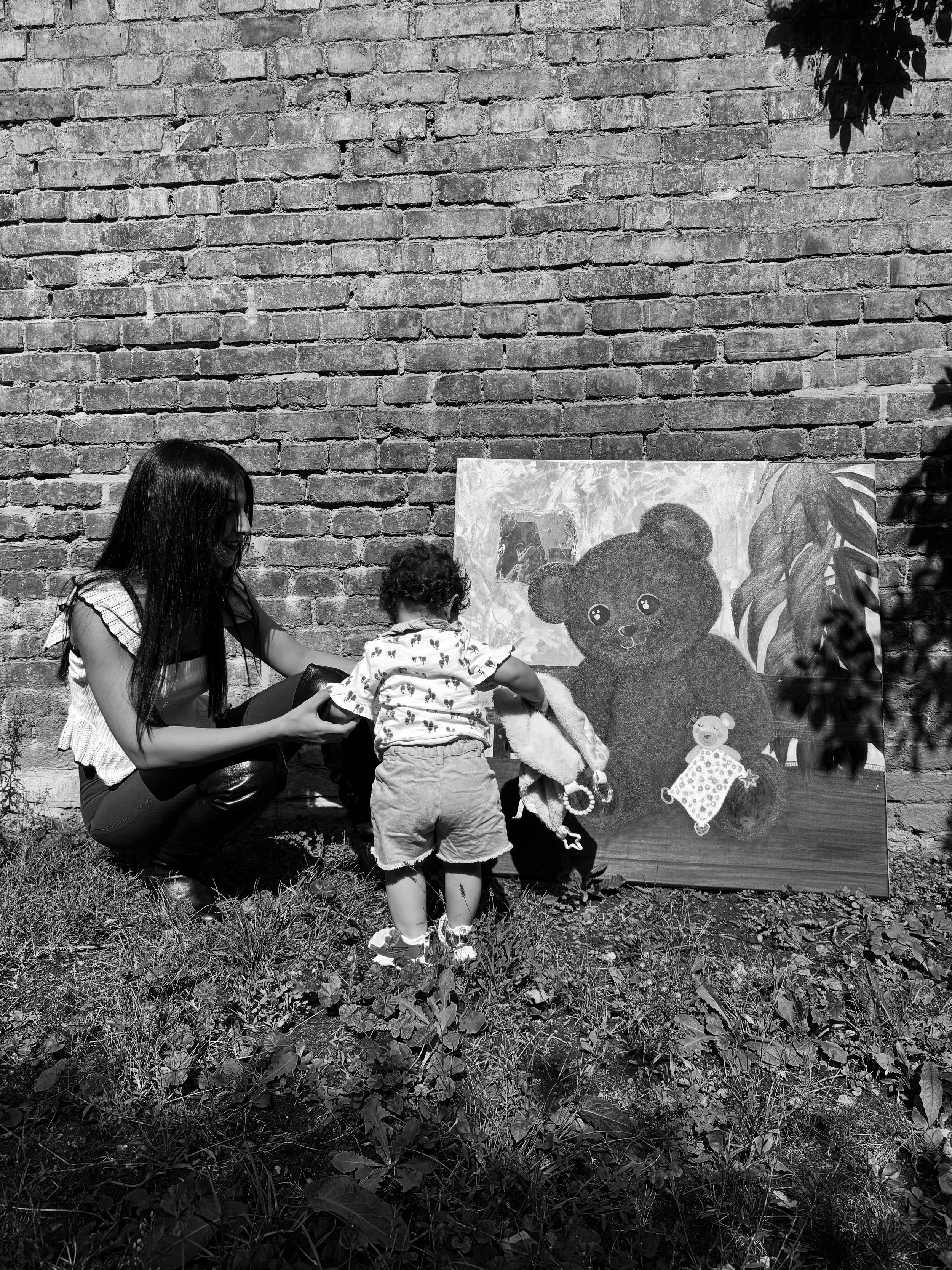 Textured mixed media artwork of a teddy bear symbolizing motherhood, love, and protection, from the Sacred Hugs collection by mKunstraum