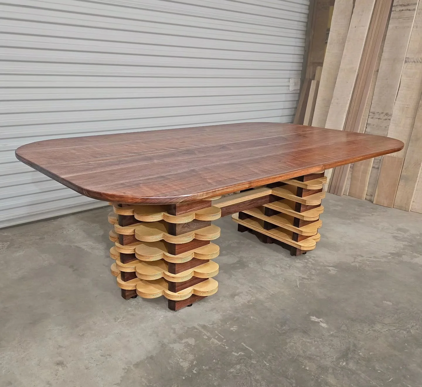 The Marina City table has landed. Fun exploration with baltic birch and walnut. All of the walnut was once a single log that grew in Chapel Hill and sourced from @thelumberdistrict 
.
.
.
.
#wkcwoodworks #durham #woodworking #furniture #walnut #dinin