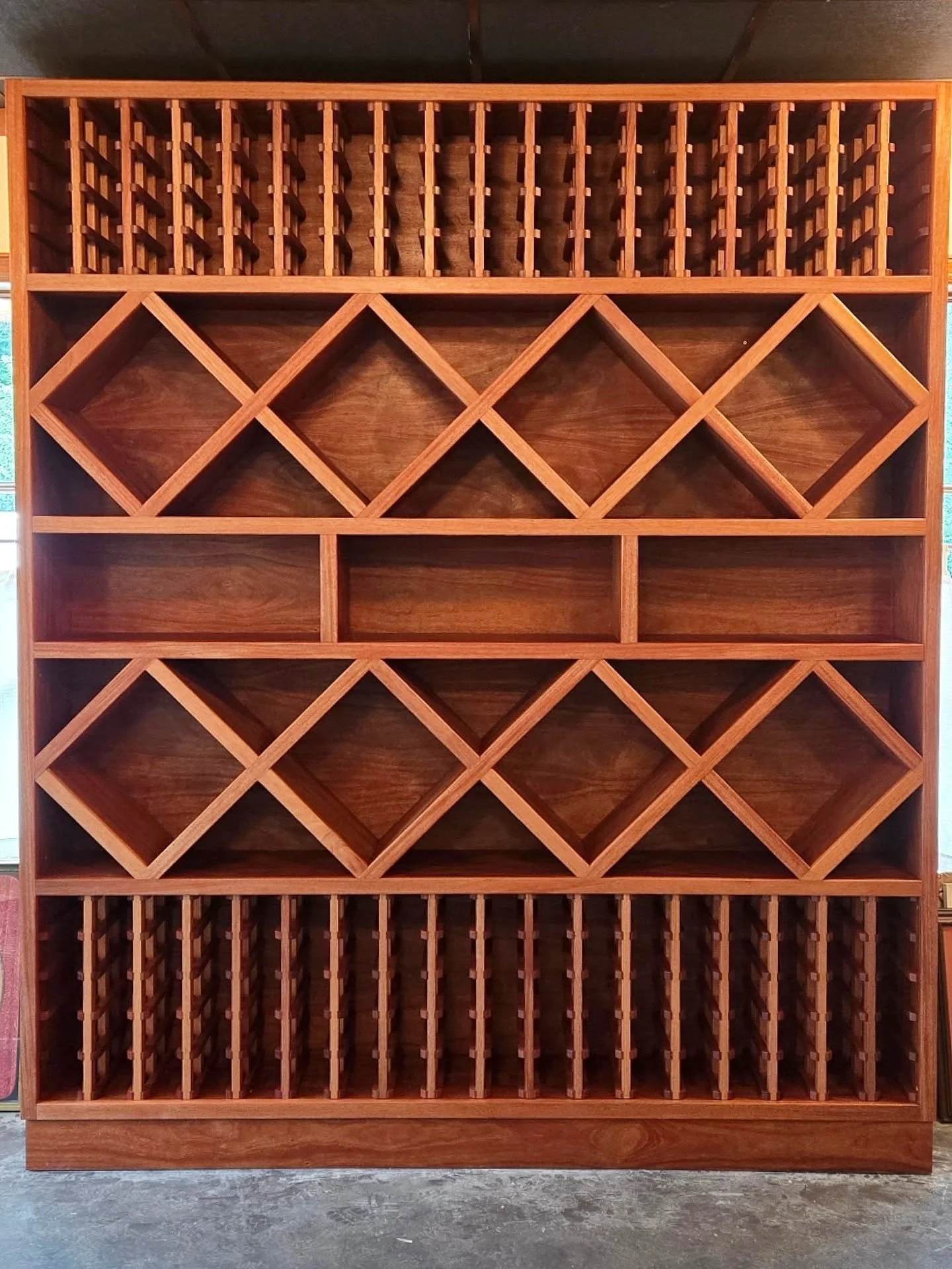 Wrapped up a fun wine rack made with African Mahogany. Finished with @osmo_usa polyX.
.
.
.
#wkcwoodworks #woodworking #durham