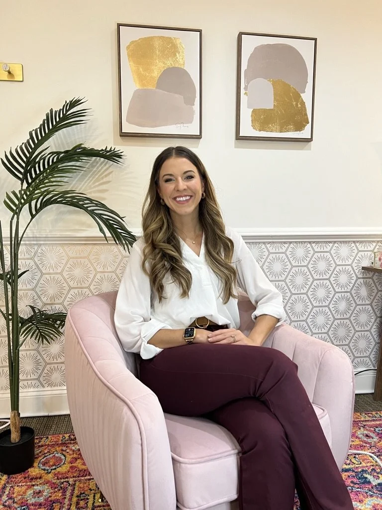 therapist for teens sits in chair, therapist for young adults in northern virginia, therapist for anxiety, depression, trauma