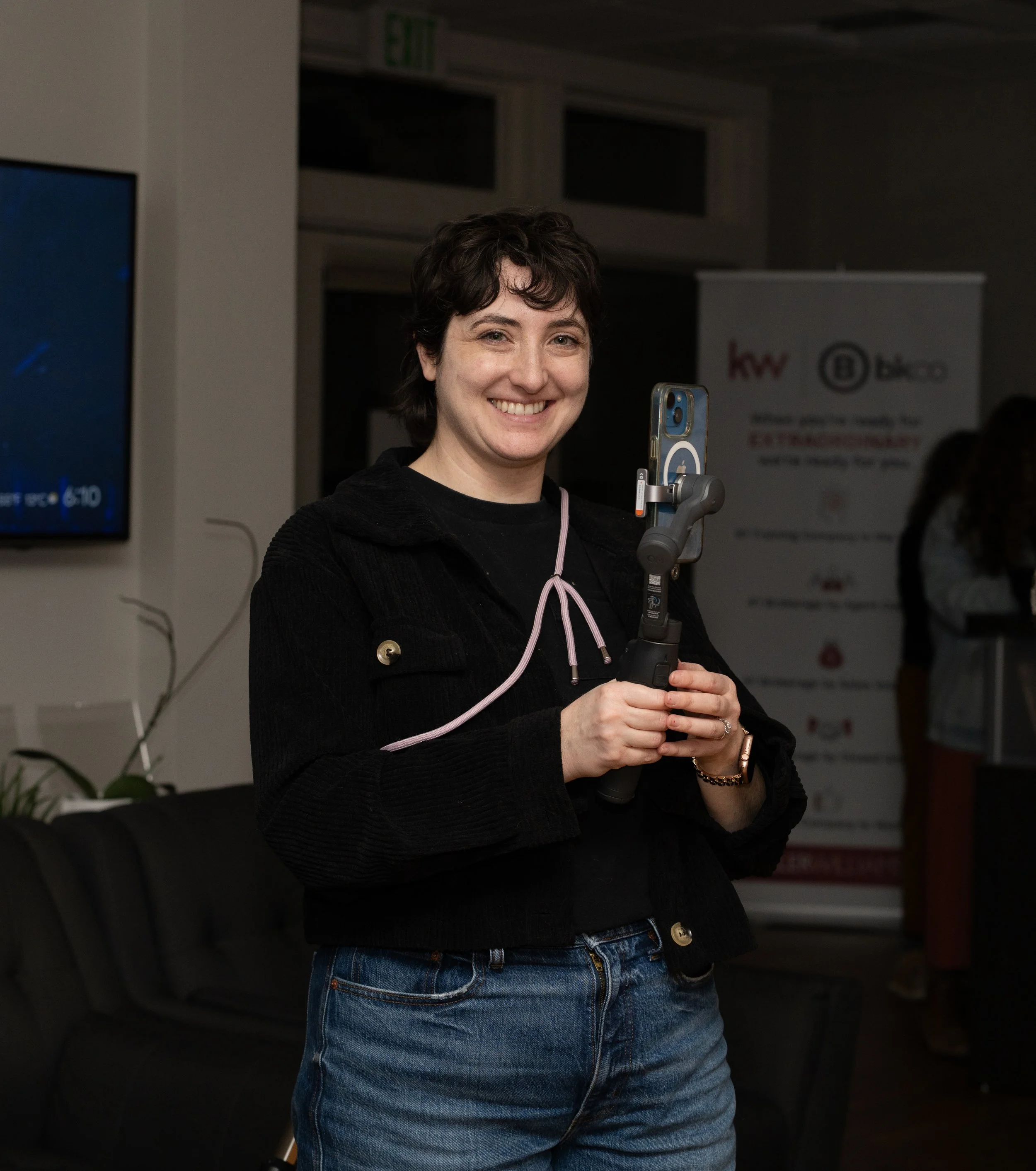 Jen filming at a podcast event in Seattle, WA