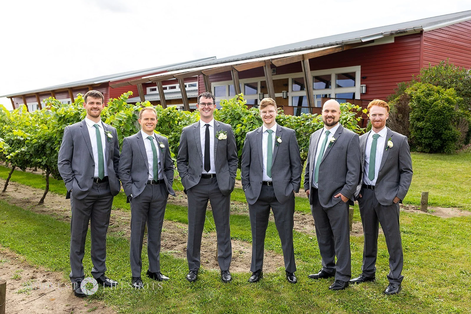 Four Daughters Vineyard & Winery wedding featuring lush creamy whites, soft pinks, and unexpected brown blooms, with romantic wedding florals in Spring Valley, MN.

