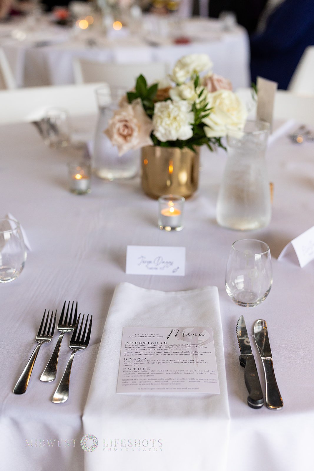 Four Daughters Vineyard & Winery wedding featuring modern, garden-inspired wedding florals, lush greenery, statement blooms, and romantic floral details in Spring Valley, MN.
