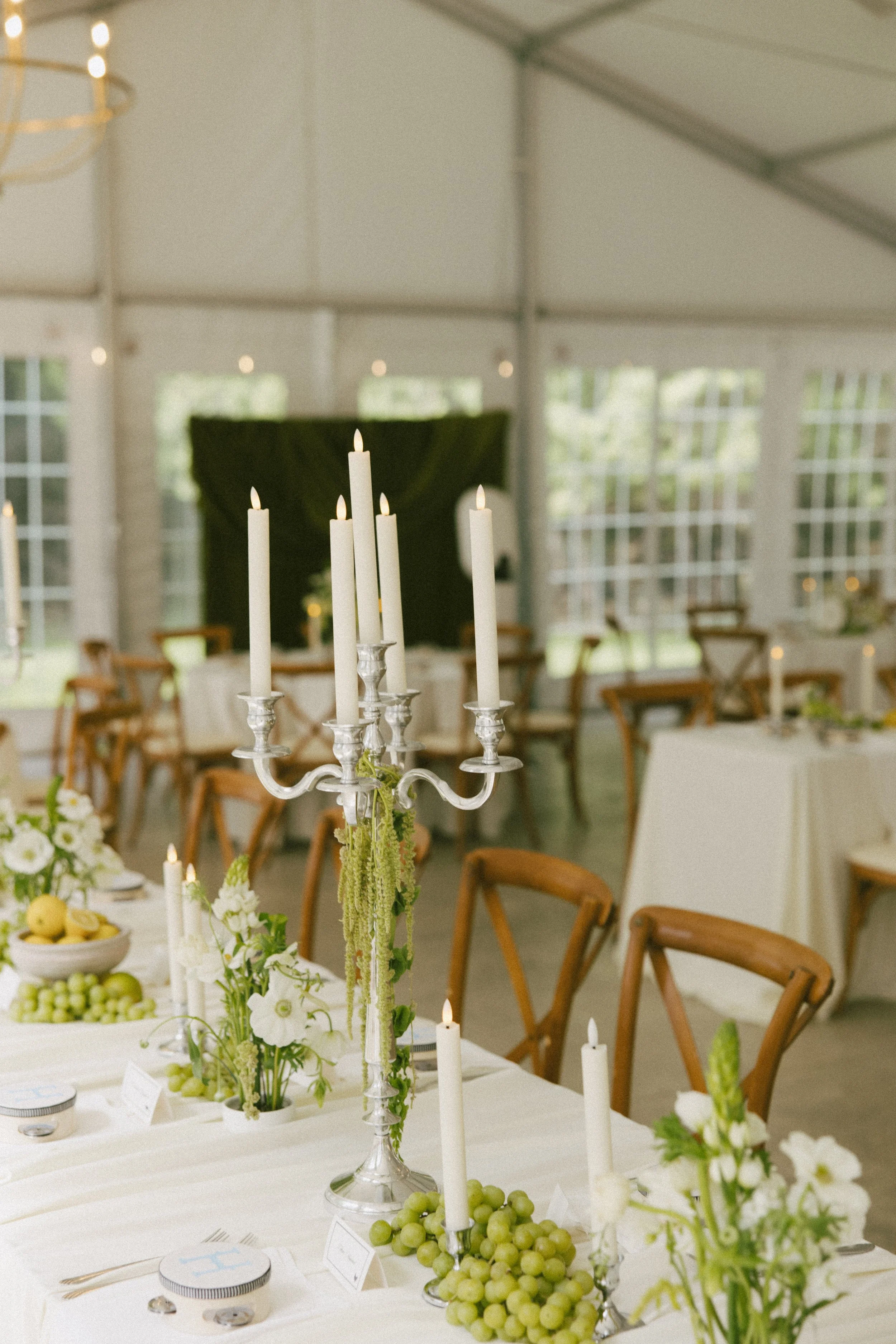 Romantic Rochester, MN wedding flowers featuring a modern white bridal bouquet, lush greenery, statement blooms, and garden-inspired ceremony florals.