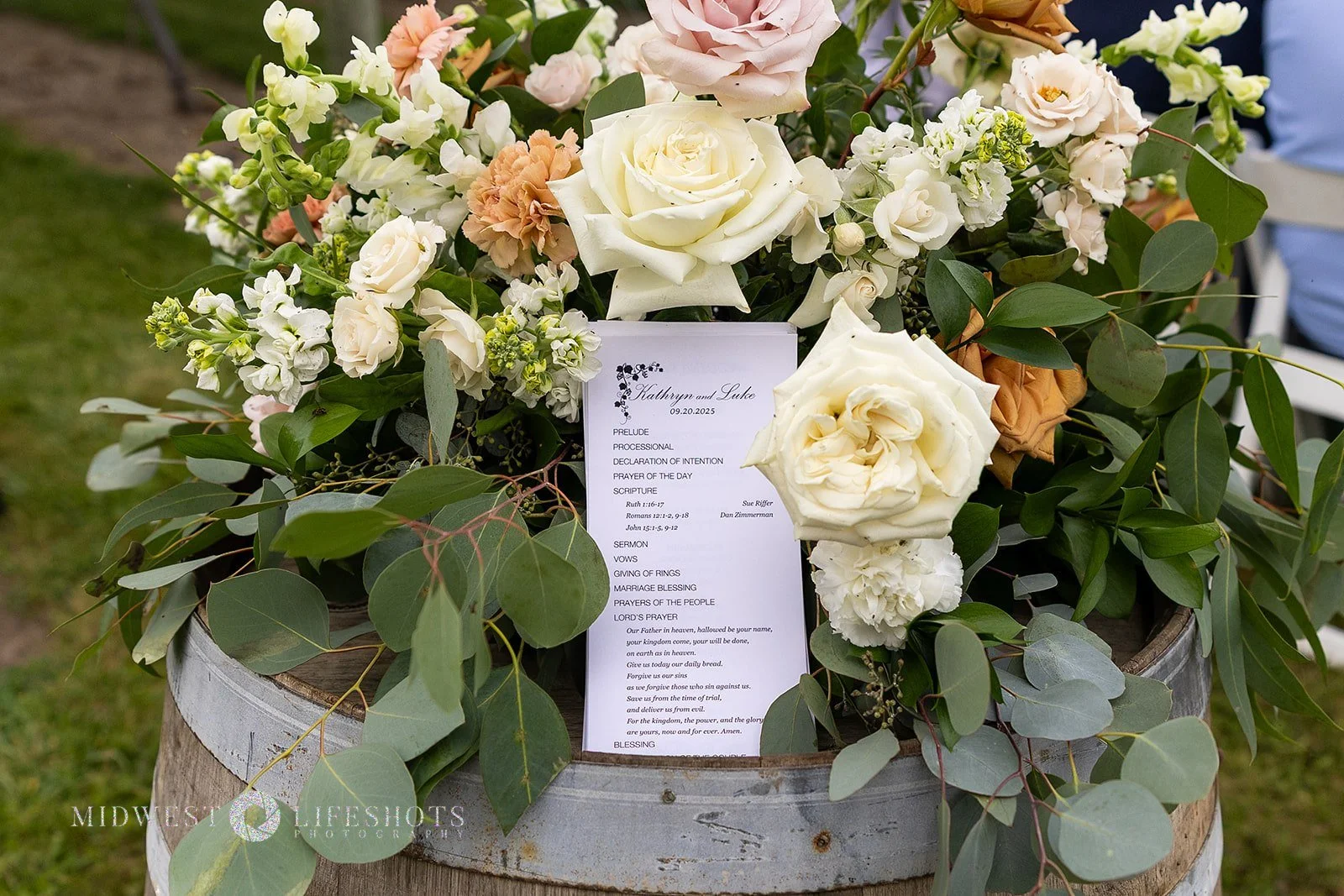 Four Daughters Vineyard & Winery wedding featuring lush creamy whites, soft pinks, and unexpected brown blooms, with romantic wedding florals in Spring Valley, MN.