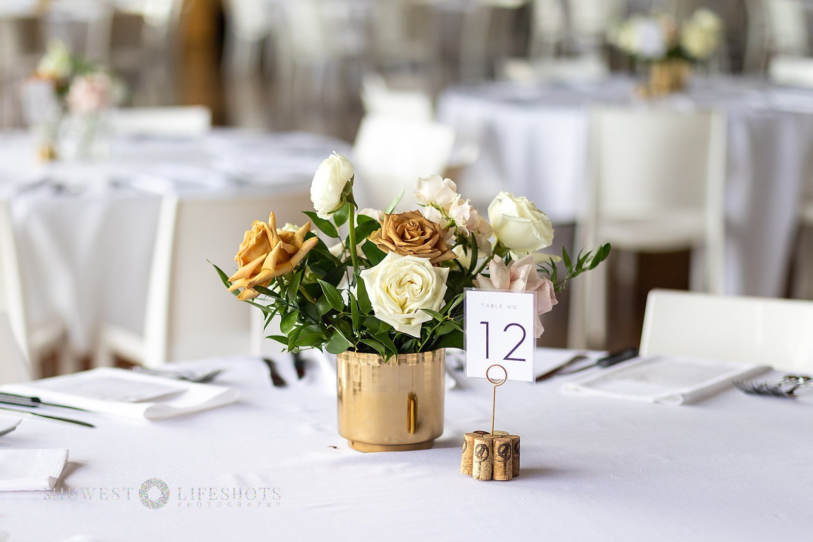 Four Daughters Vineyard & Winery wedding featuring modern, garden-inspired wedding florals, lush greenery, statement blooms, and romantic floral details in Spring Valley, MN.
