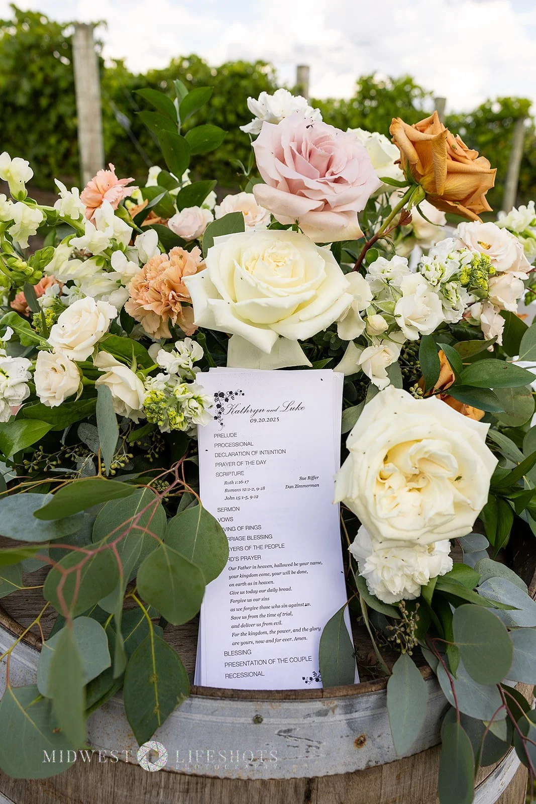 Four Daughters Vineyard & Winery wedding featuring modern, garden-inspired wedding florals, lush greenery, statement blooms, and romantic floral details in Spring Valley, MN.
