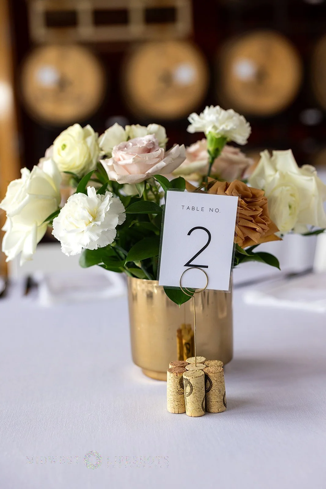 Four Daughters Vineyard & Winery wedding featuring modern, garden-inspired wedding florals, lush greenery, statement blooms, and romantic floral details in Spring Valley, MN.
