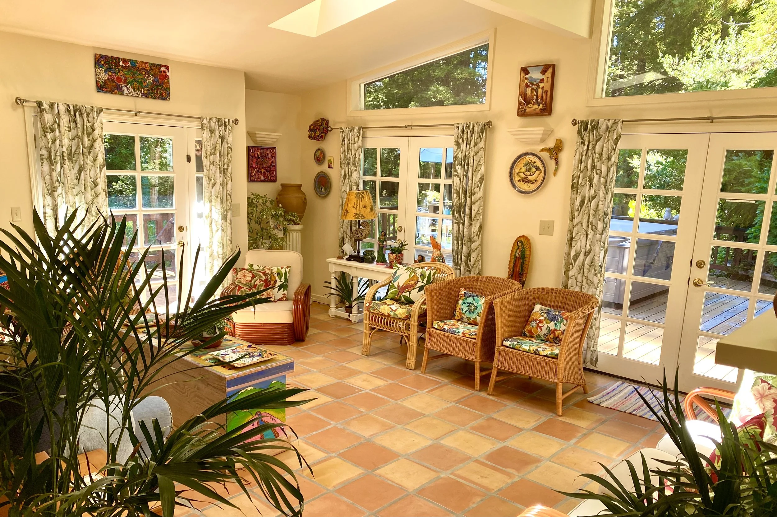 Sun Room with beautiful South American art and Foliage