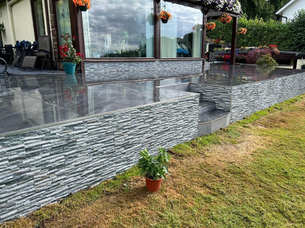 deck build, tiled and stone work done with tiles and marble on surface!