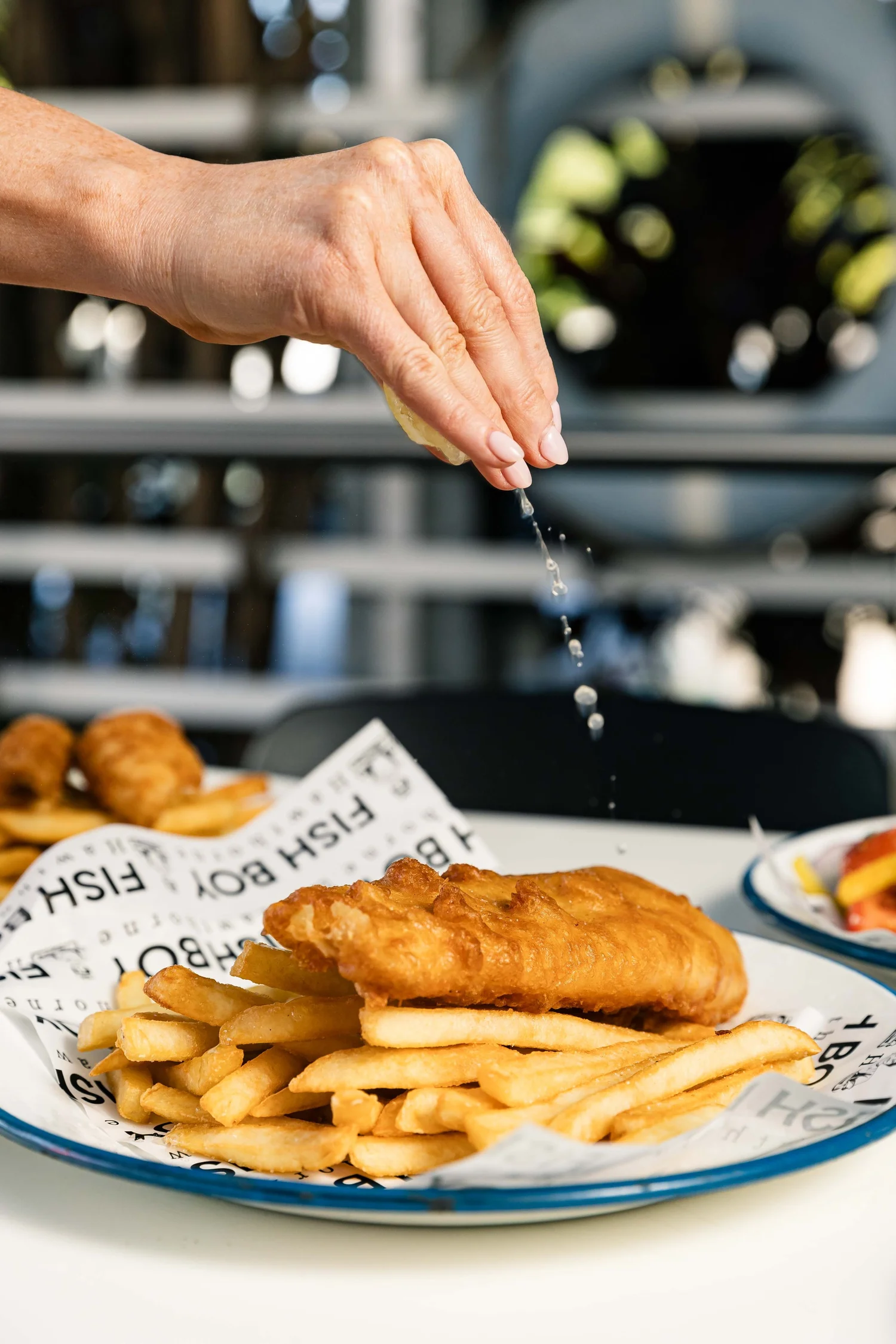 Fish Boy battered fish and chips with freshly squeezed lemon