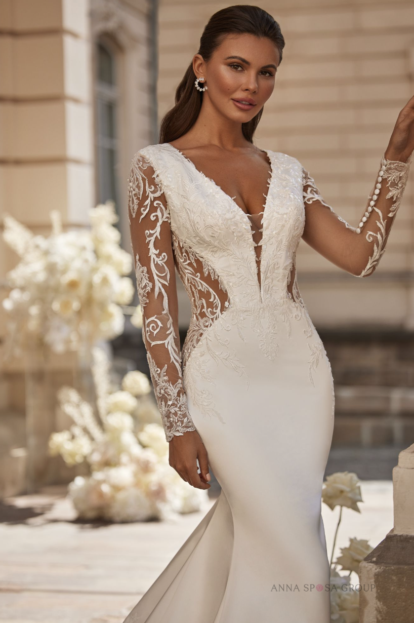 Long sleeves, mesh back, and a stunning train!