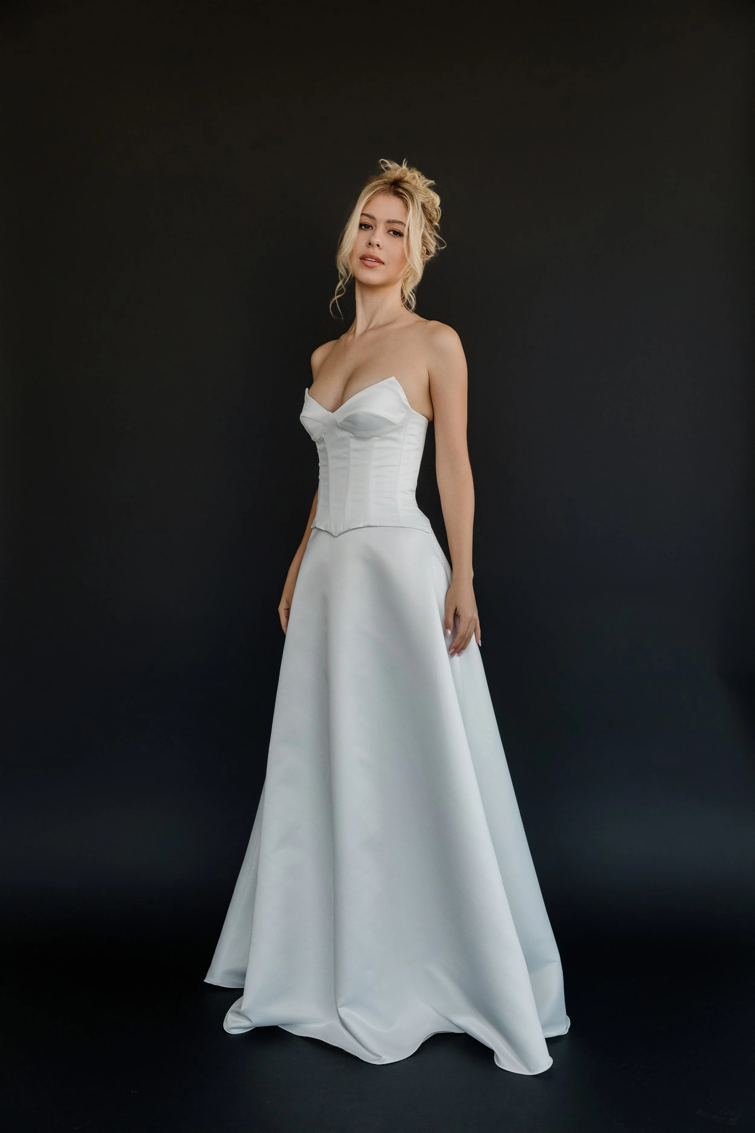 Beautiful two-piece satin gown. A-line skirt with  a structured bodice. Timeless meets modern style!